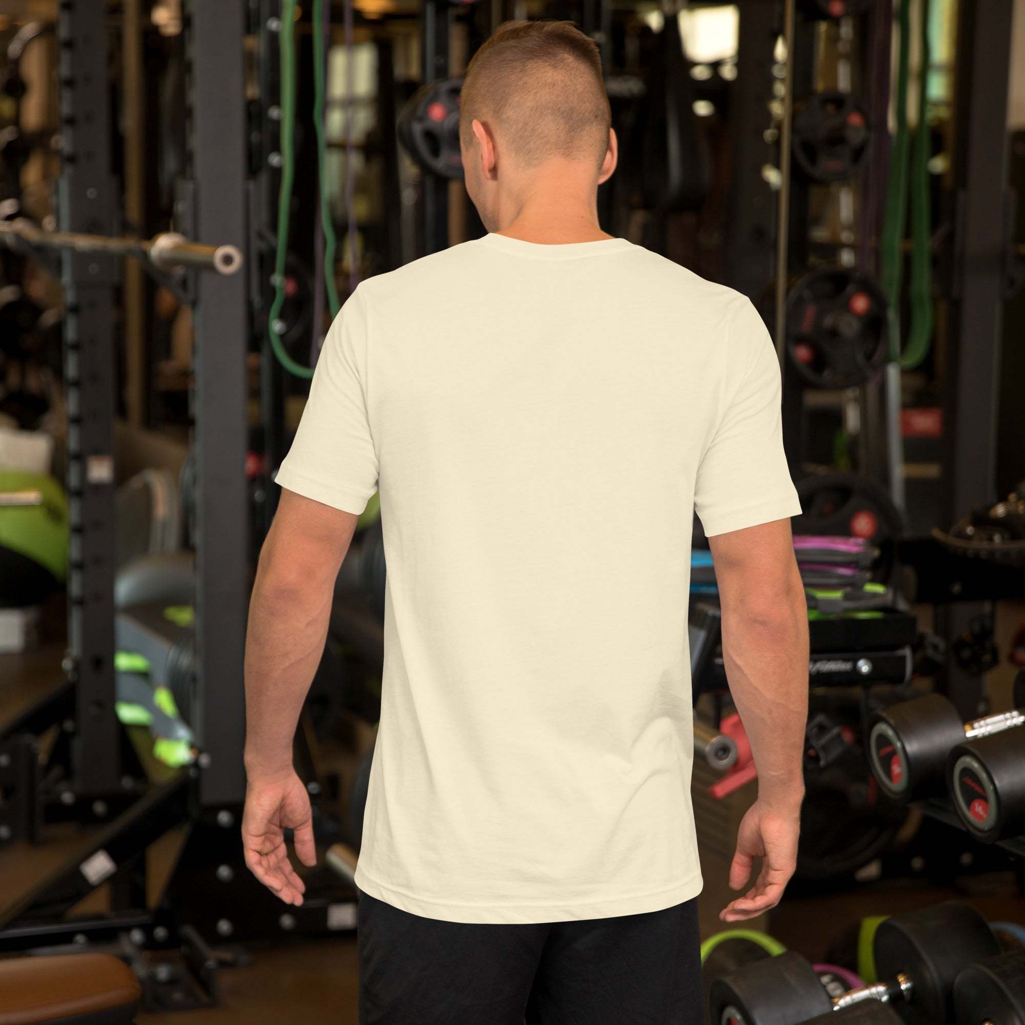 Back view of man wearing plain white Father's Day T-Shirt in gym setting