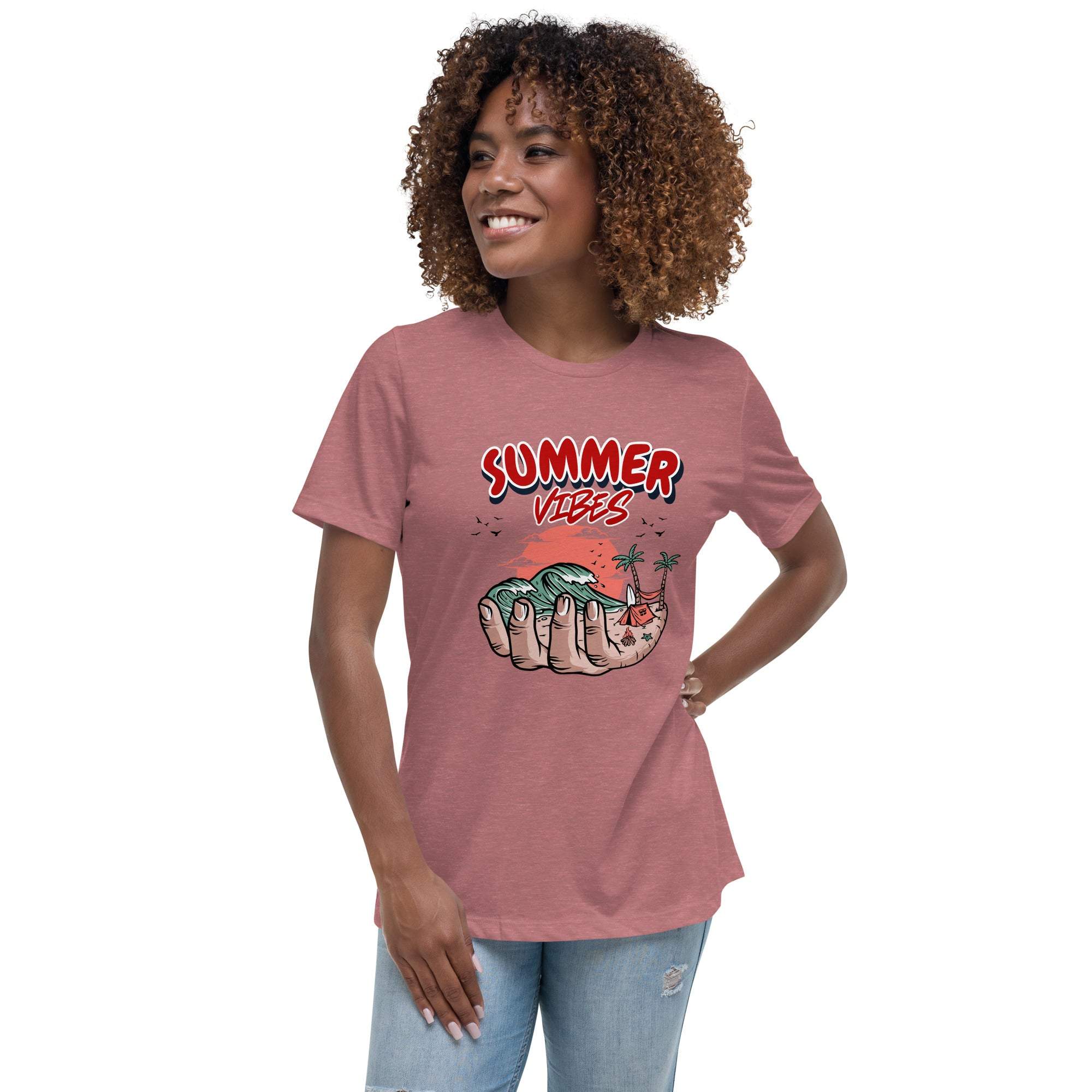 Woman wearing a pink Summer Vibes T-Shirt with retro beach graphic held in palm of hand design