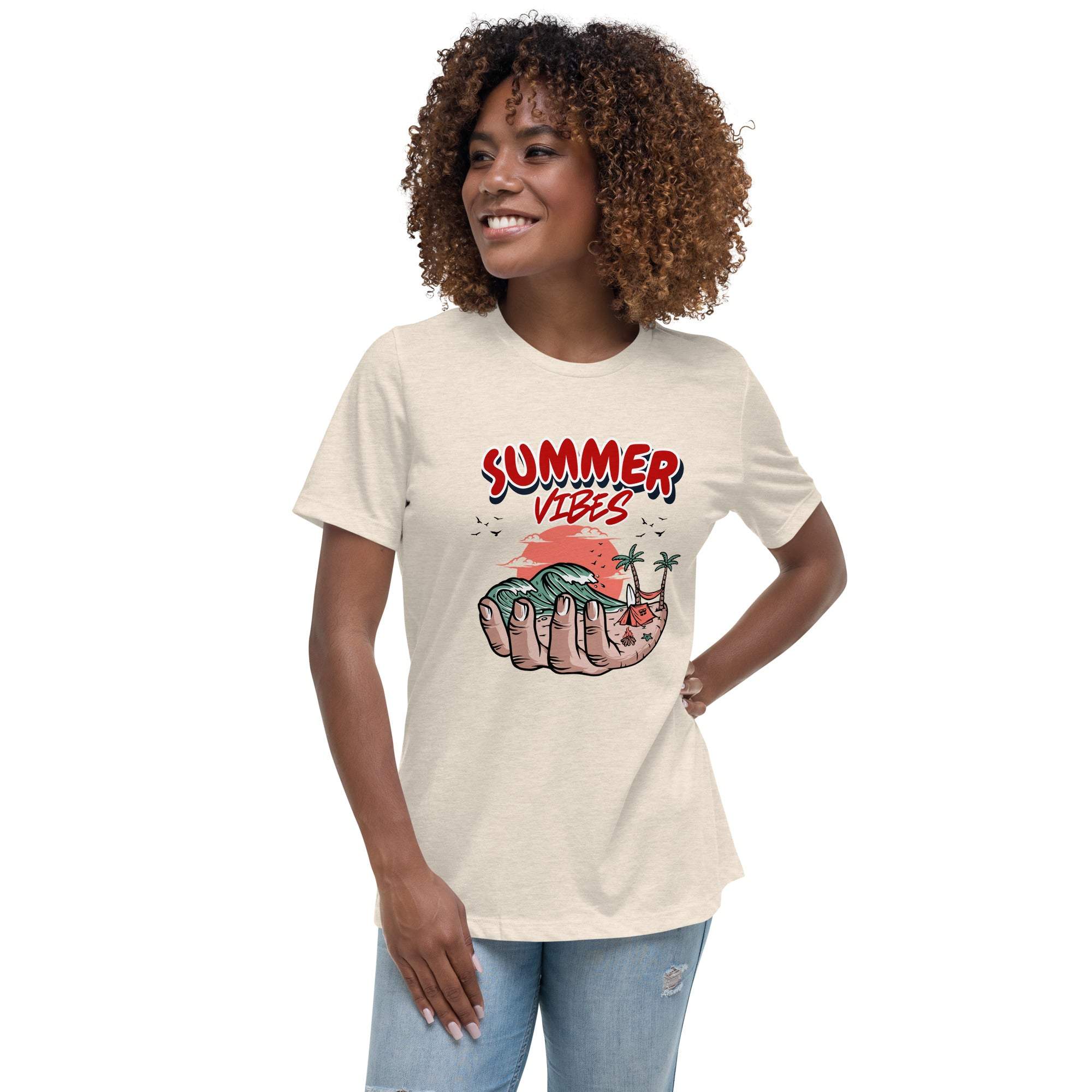 Woman wearing Summer Vibes T-Shirt with retro beach graphic featuring hand holding waves and palm trees