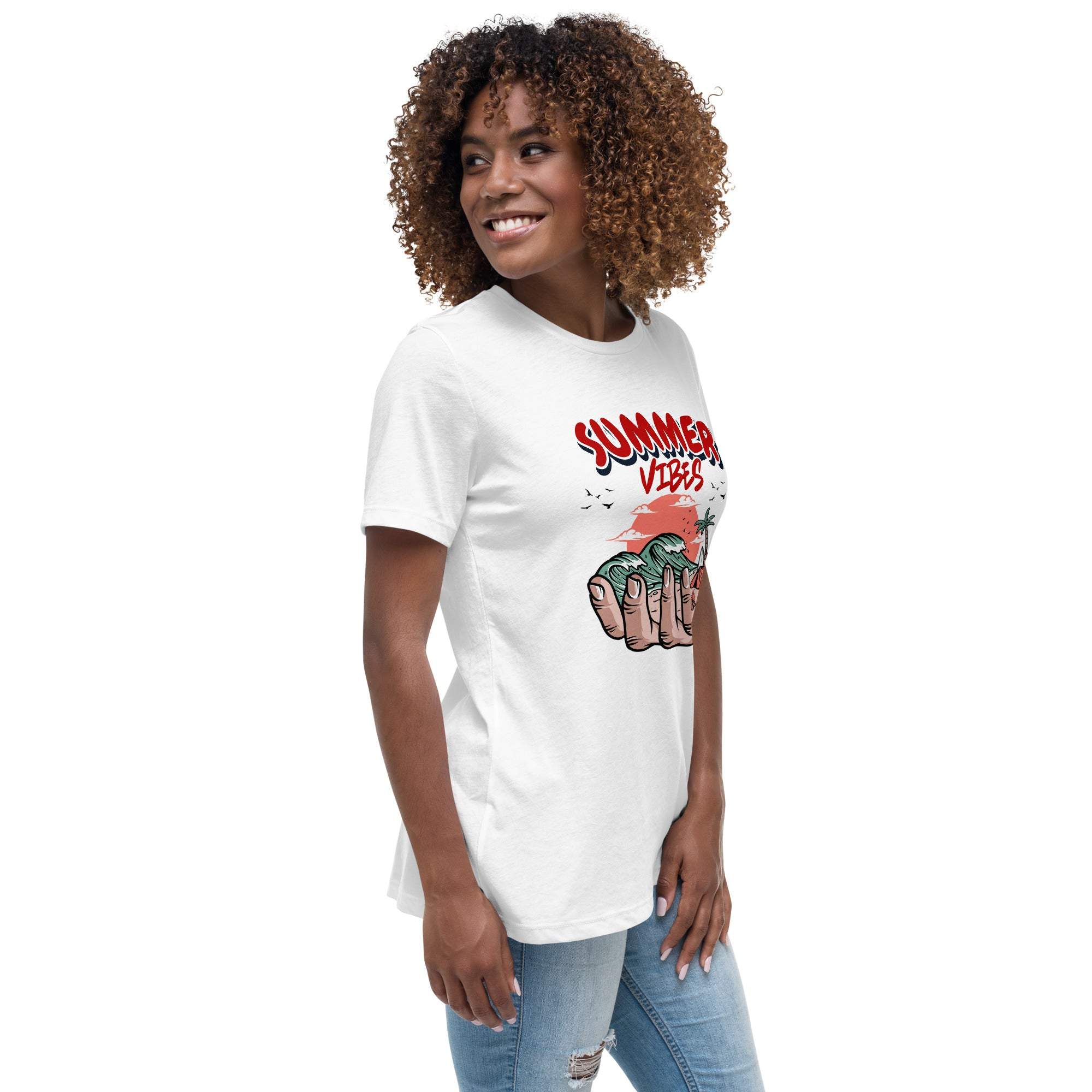Woman wearing white Summer Vibes T-Shirt with retro beach graphic and text in red.