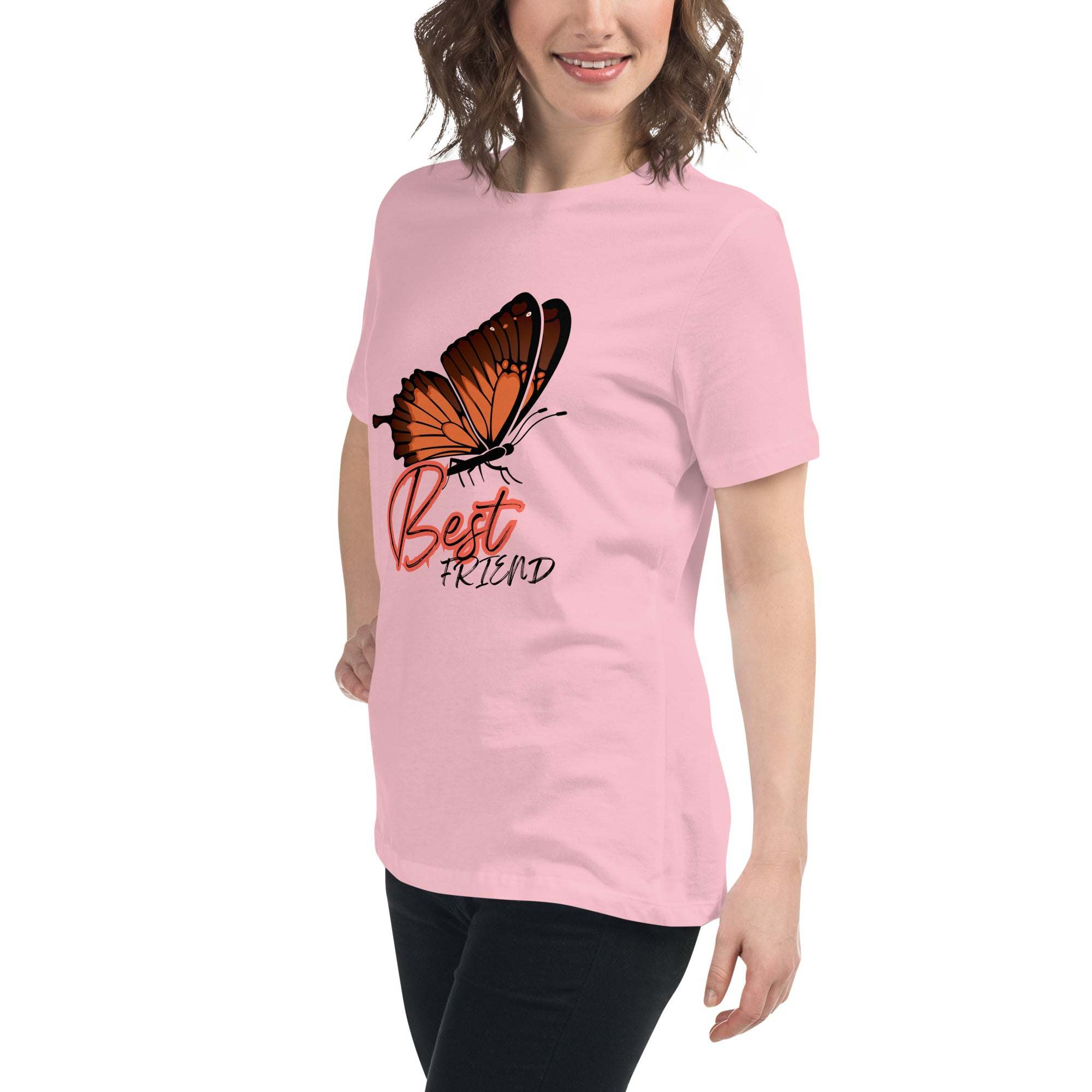 Woman wearing a pink Best Friend butterfly t-shirt with orange butterfly graphic and text, casual unisex fit.