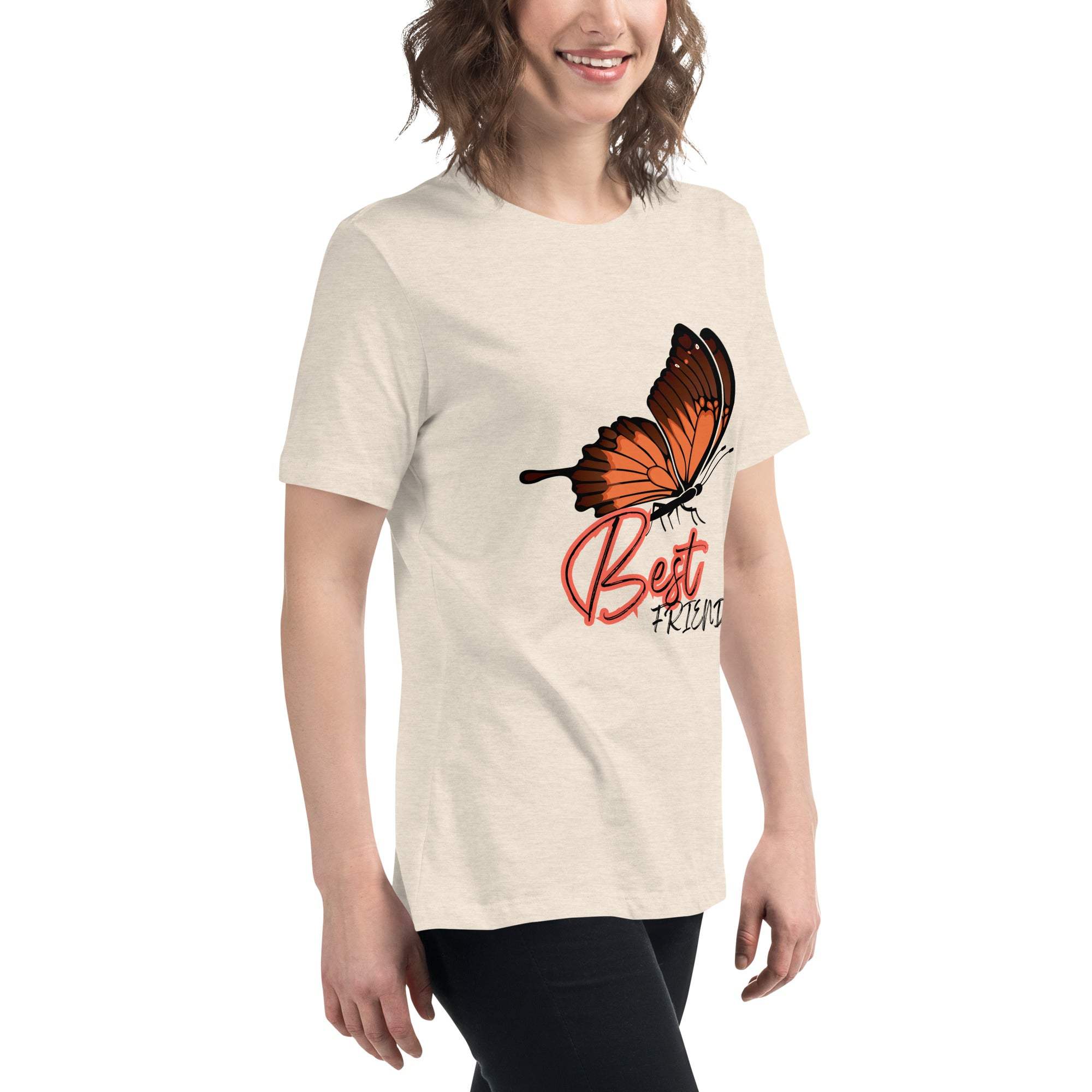 Woman wearing a beige Best Friend Butterfly T-Shirt with a large orange butterfly graphic and "Best Friend" text on the front