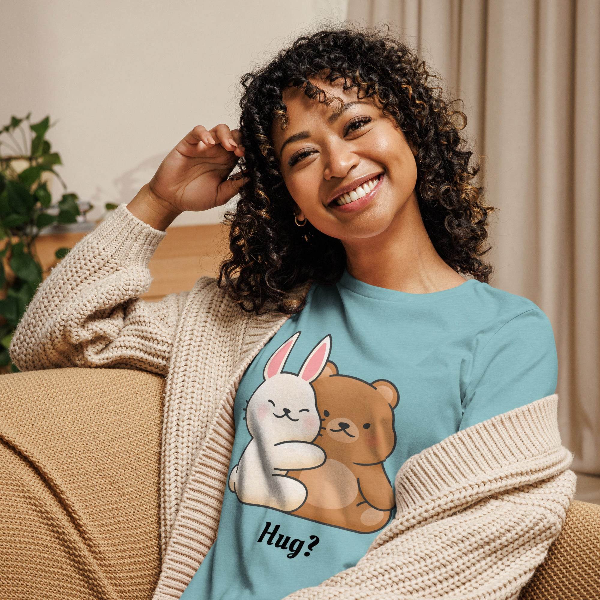 Smiling woman wearing Cute Bunny and Bear Hug T-Shirt with pastel blue color and cuddly cartoon hug design
