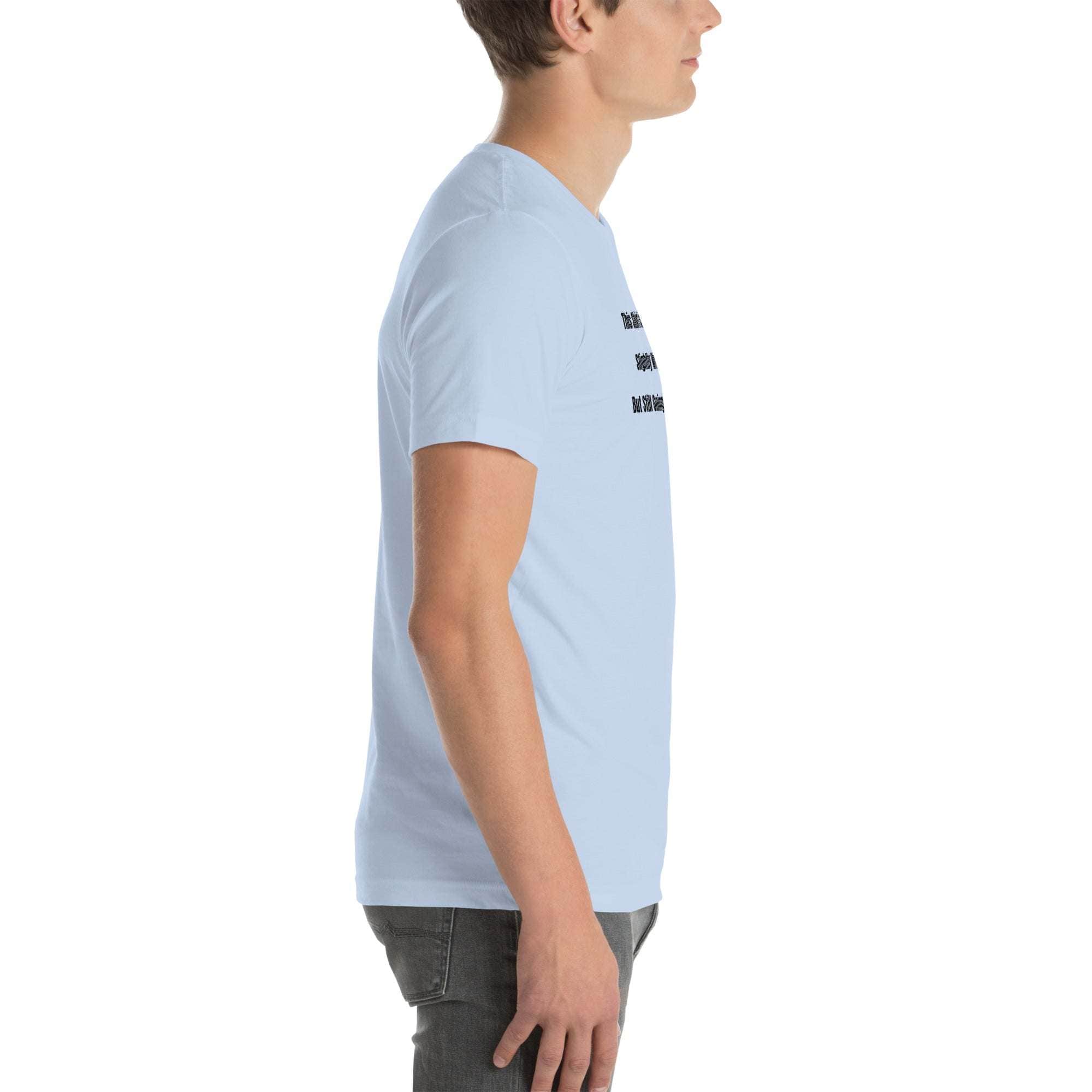 Side view of man wearing light blue funny wrinkled t-shirt with humorous text, casual old person humor tee
