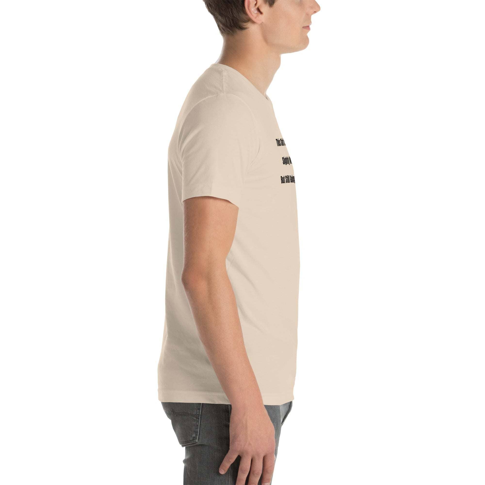 Side view of a man wearing a beige funny wrinkled t-shirt with humorous printed text in casual fit old person humor t-shirt