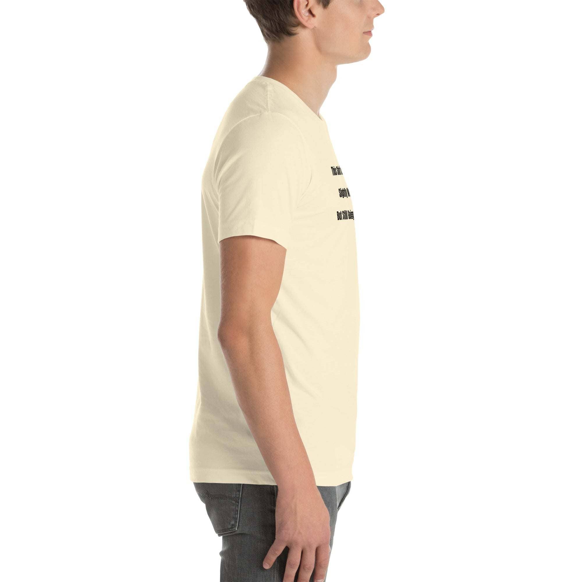 Side view of a man wearing a cream Funny Wrinkled T-Shirt with humorous text, unisex fit, soft cotton, casual style, old person humor t-shirt