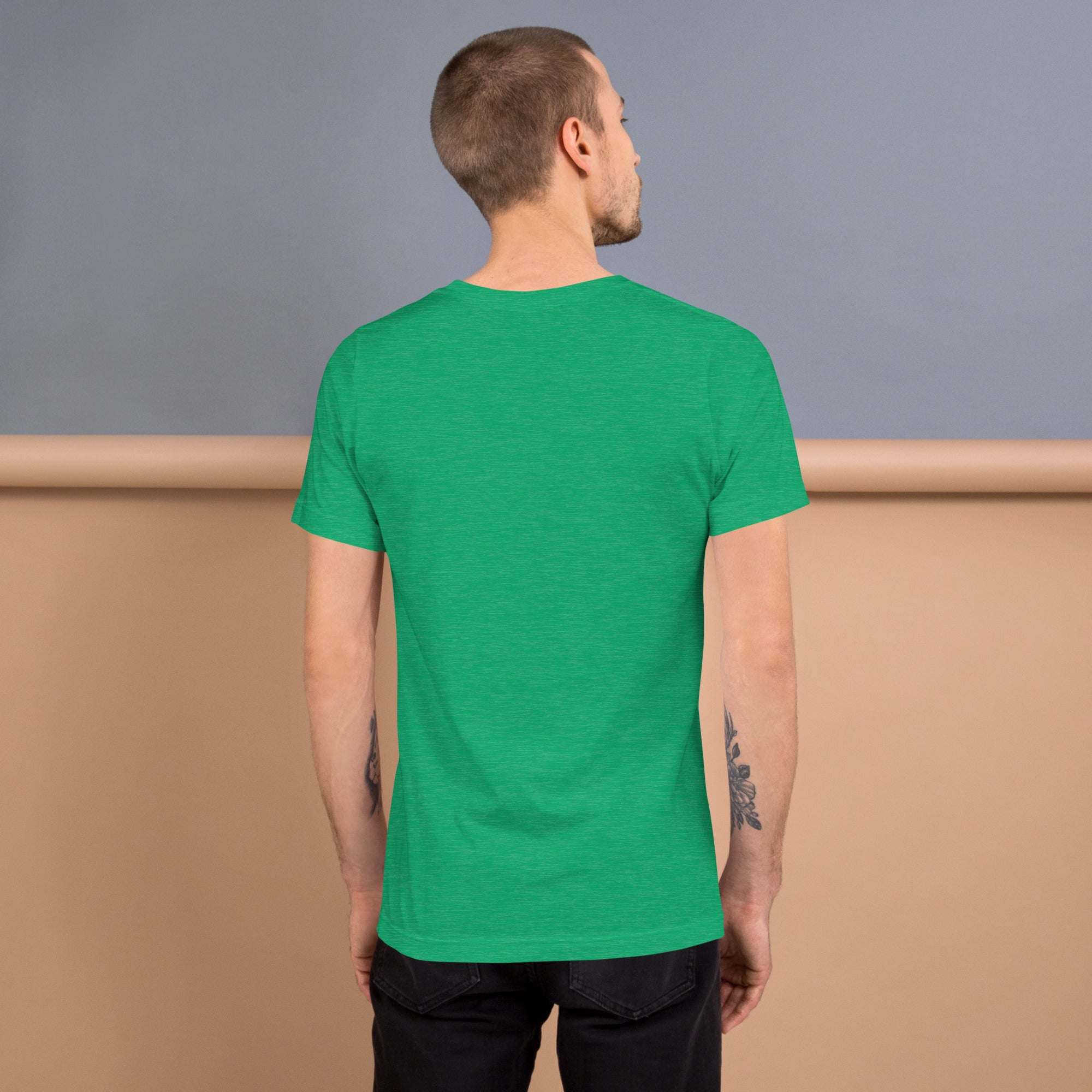 Man wearing green Good Vibes T-Shirt shown from the back