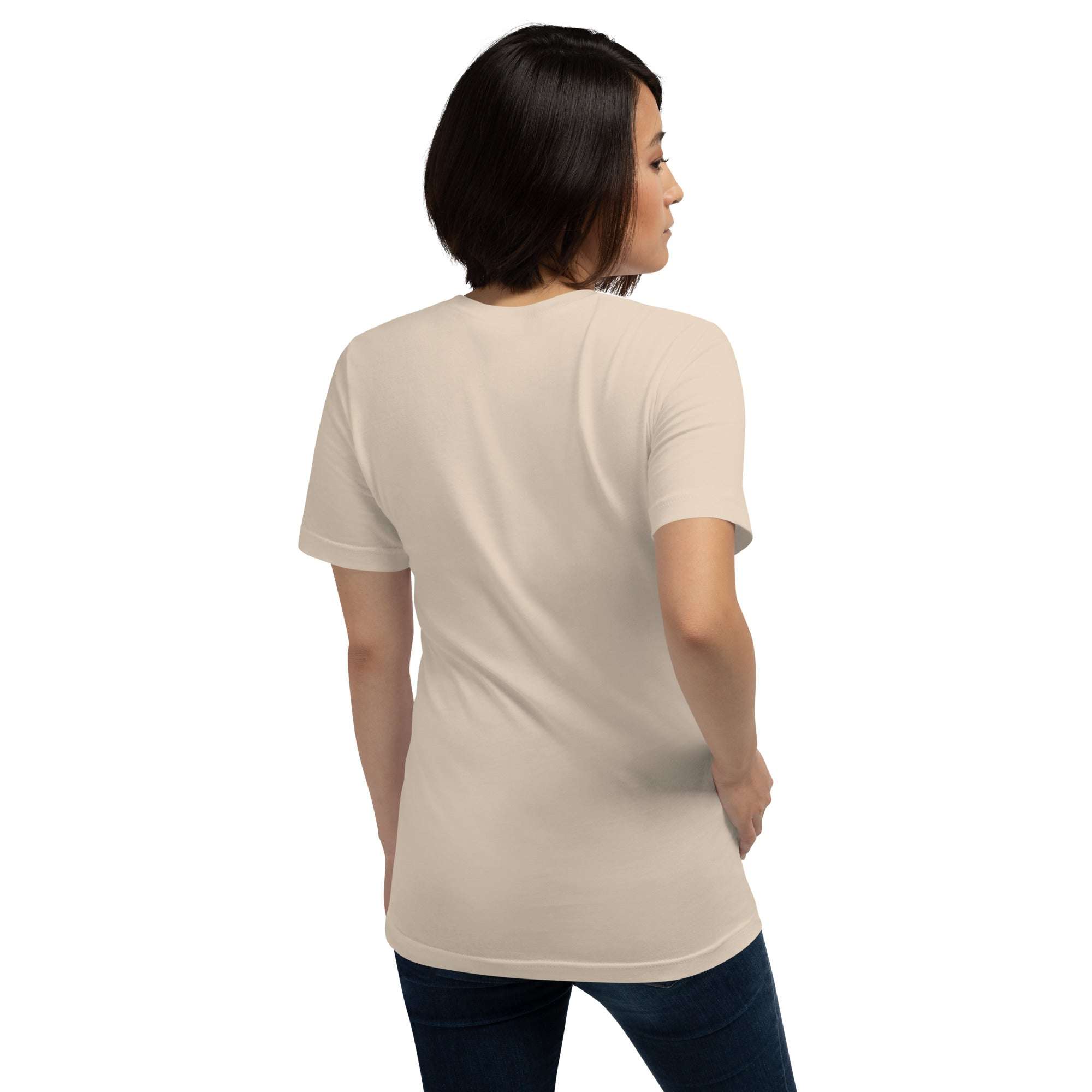 Woman wearing beige Real Queen T-Shirt with short sleeves and jeans, shown from the back