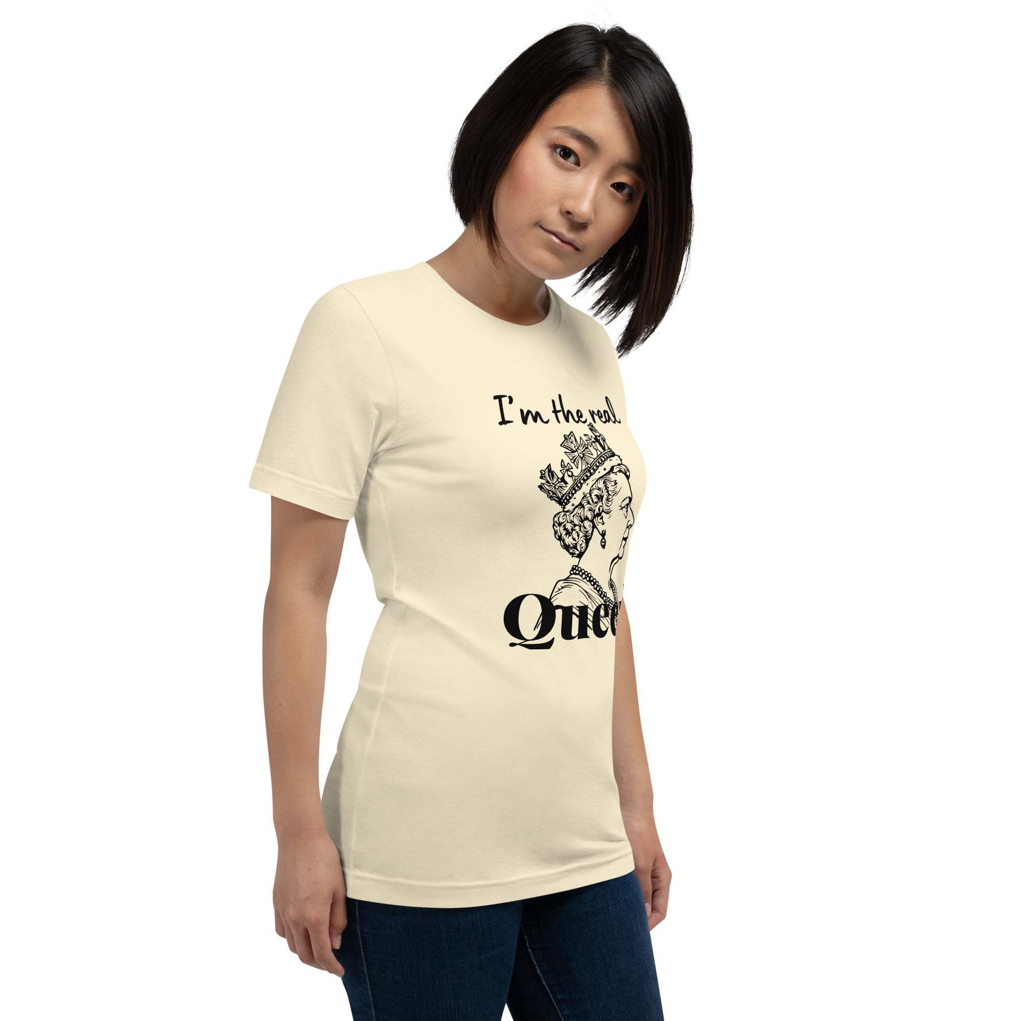 Woman wearing cream Real Queen T-Shirt with crown graphic and statement text