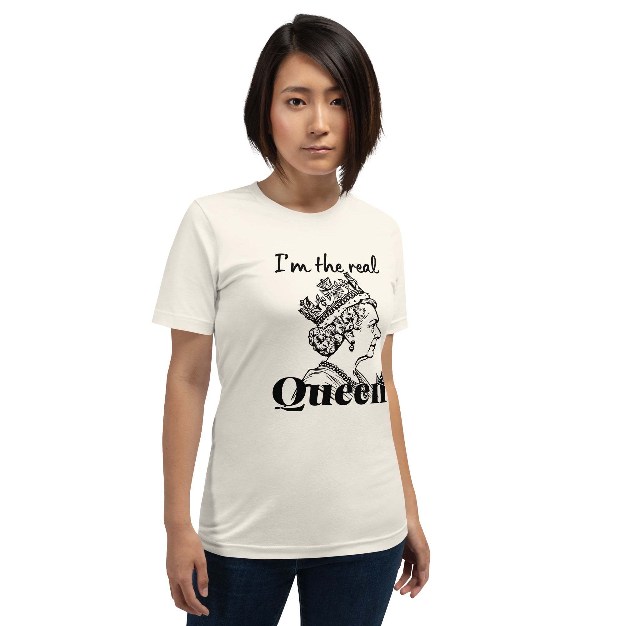 Woman wearing white "I'm the Real Queen" T-Shirt with black queen crown graphic and statement text