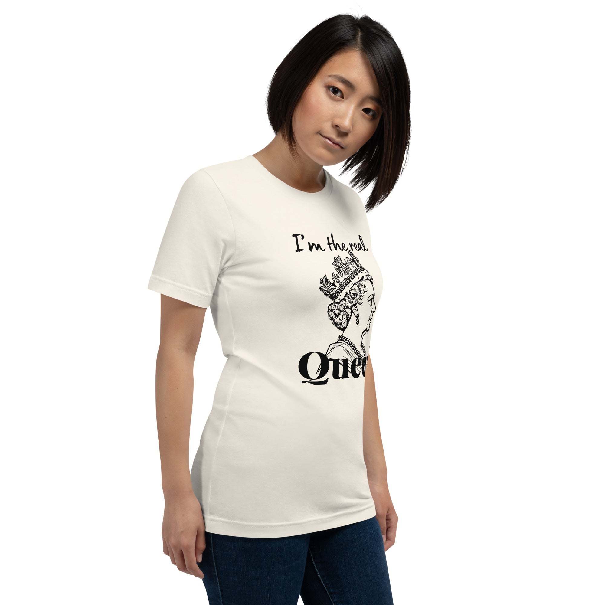 Woman wearing white Real Queen T-shirt with crown graphic and statement text