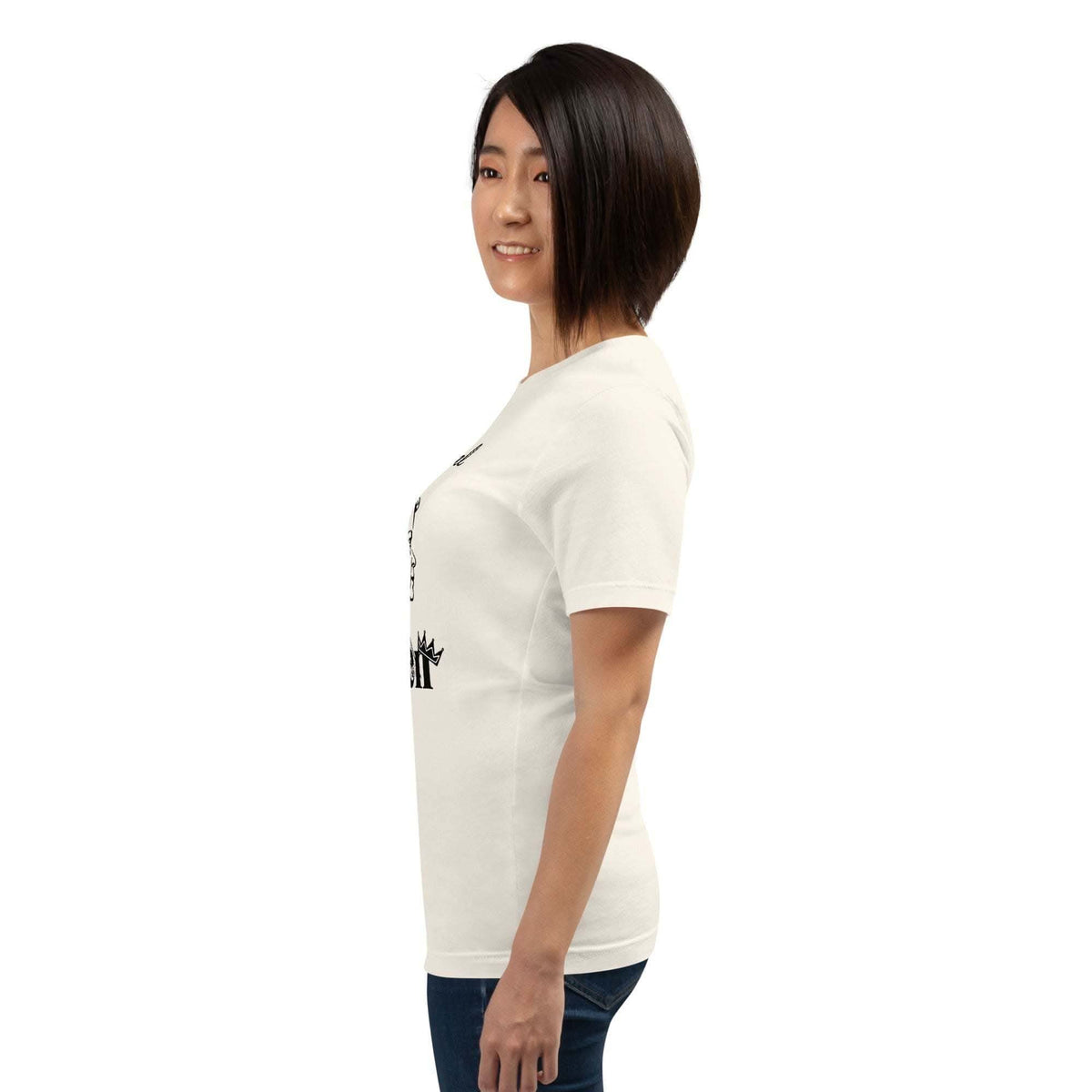 Woman wearing white "I'm the Real Queen" T-Shirt with crown graphic and confident statement text side view
