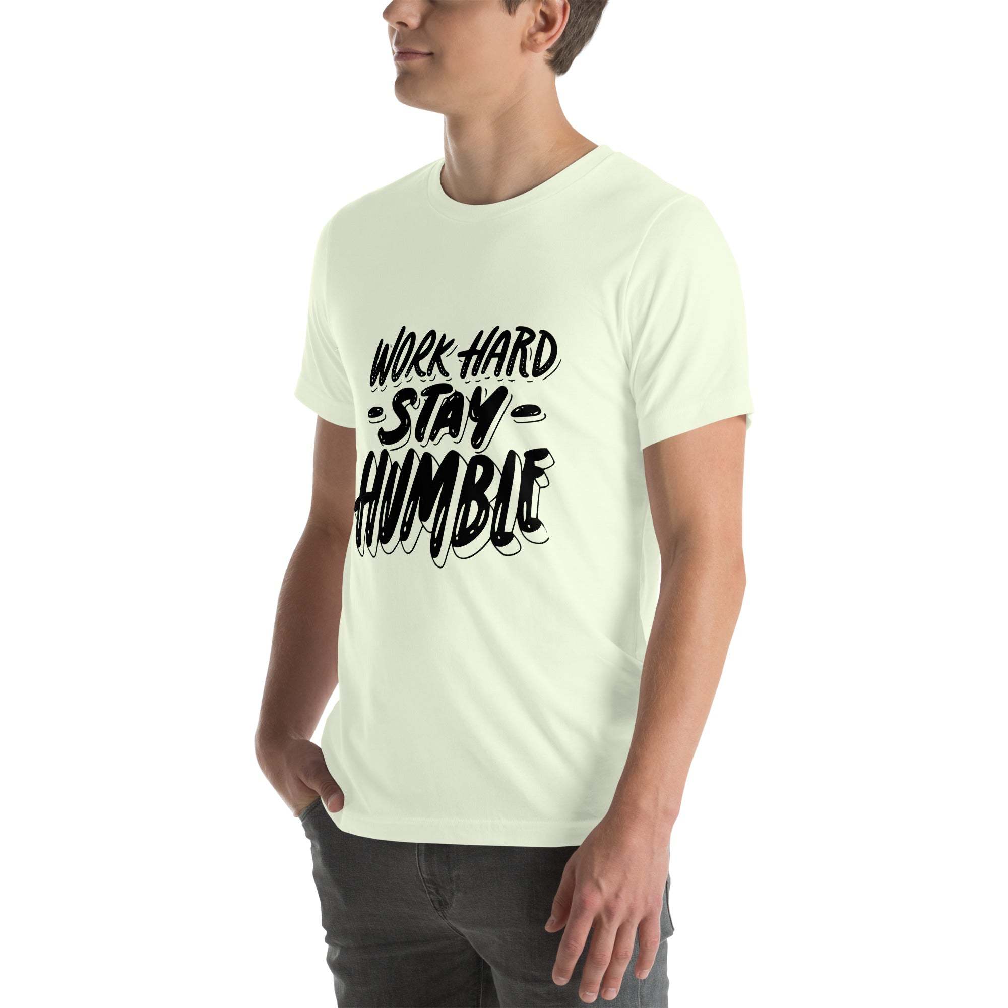 Man wearing white Work Hard Stay Humble motivational graphic t-shirt