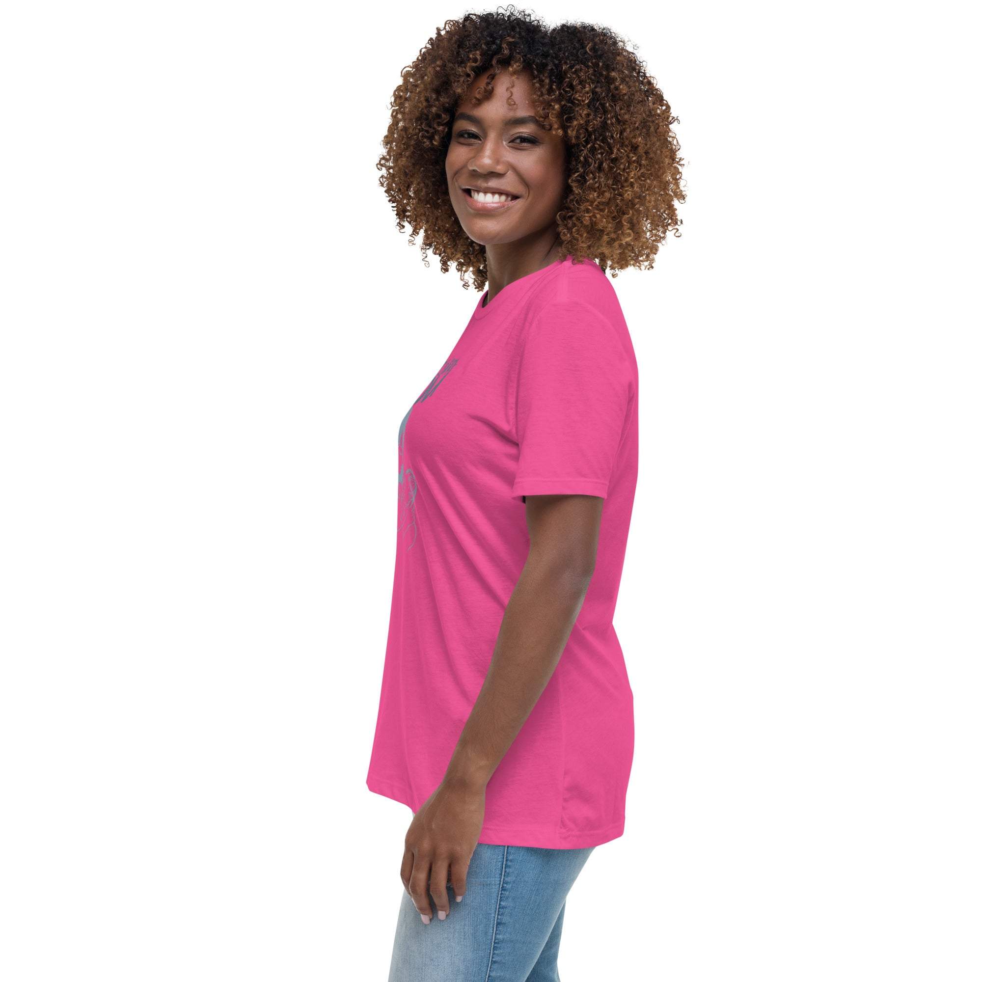 Woman wearing a pink Amazing Mom T-Shirt smiling sideways in casual jeans