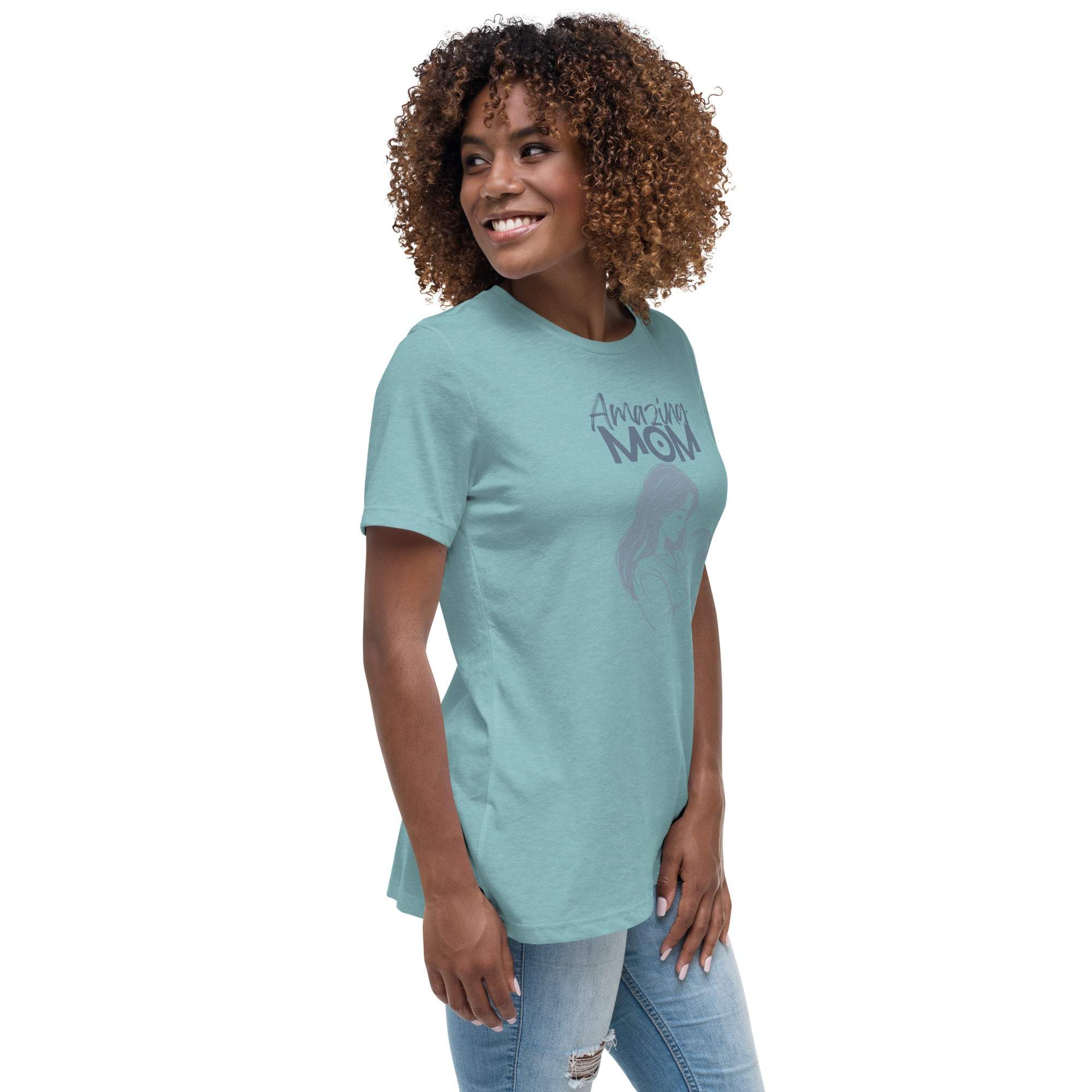 Woman wearing a light blue Amazing Mom t-shirt with short sleeves and a casual fit paired with ripped jeans