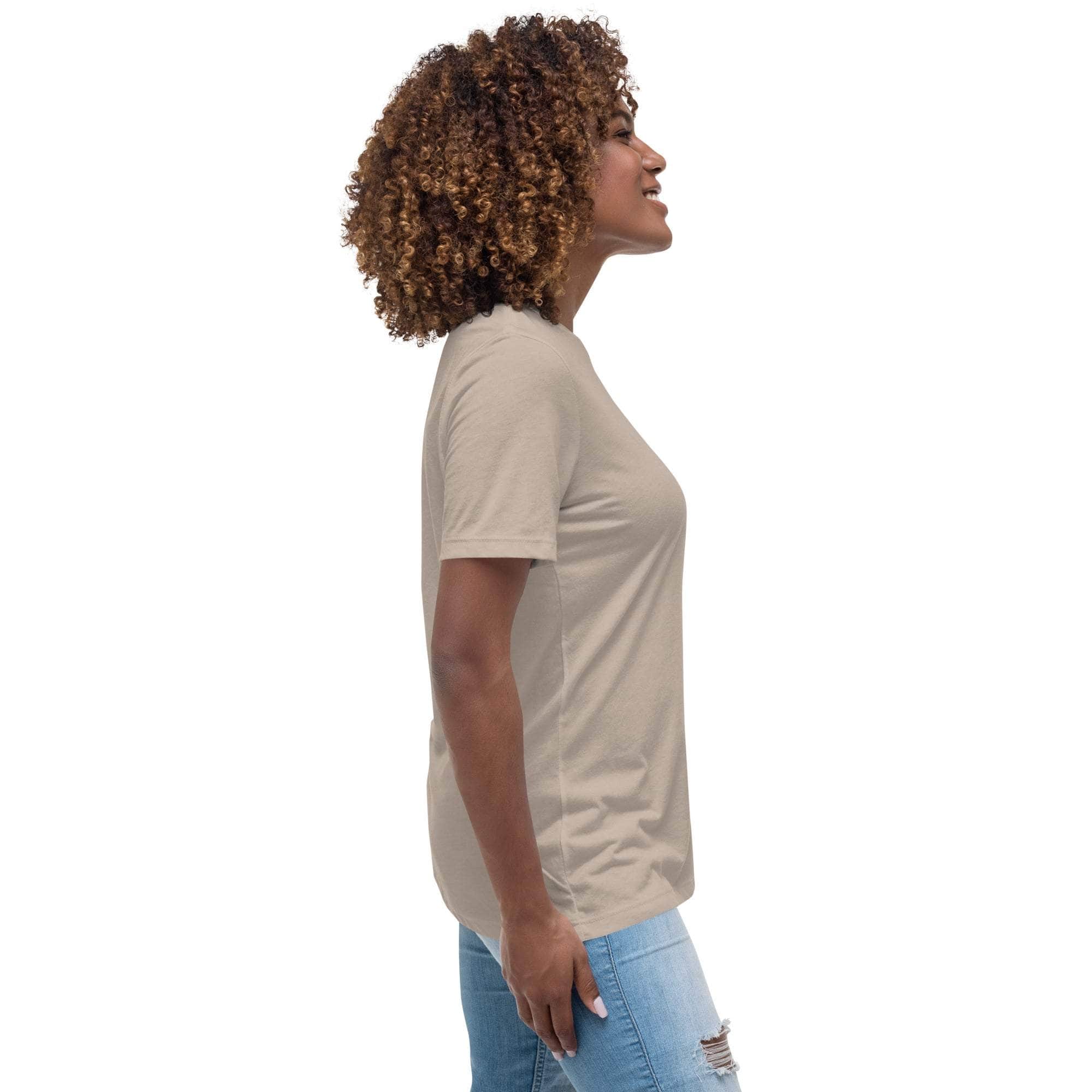 Side view of a woman wearing a beige Amazing Mom T-Shirt with short sleeves and a casual fit paired with light blue jeans