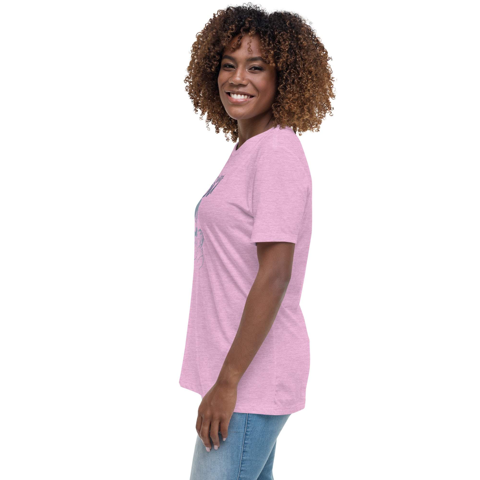 Smiling woman wearing a pink Amazing Mom T-Shirt with a relaxed fit and short sleeves standing sideways against a white background