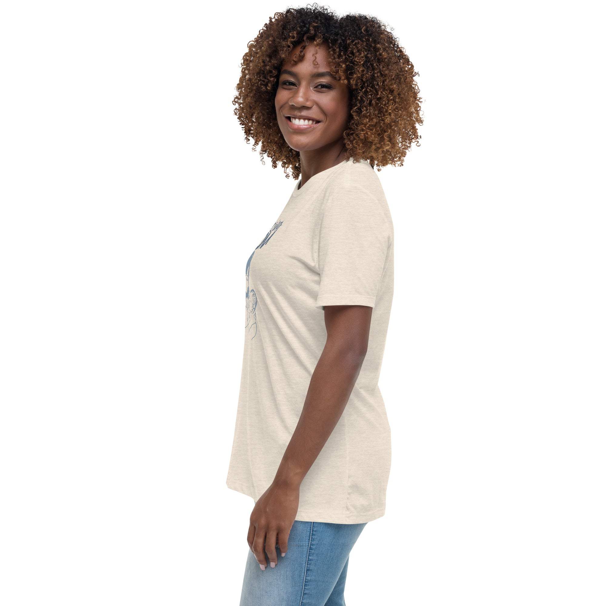 Woman wearing beige Amazing Mom T-Shirt with short sleeves and casual fit paired with blue jeans.