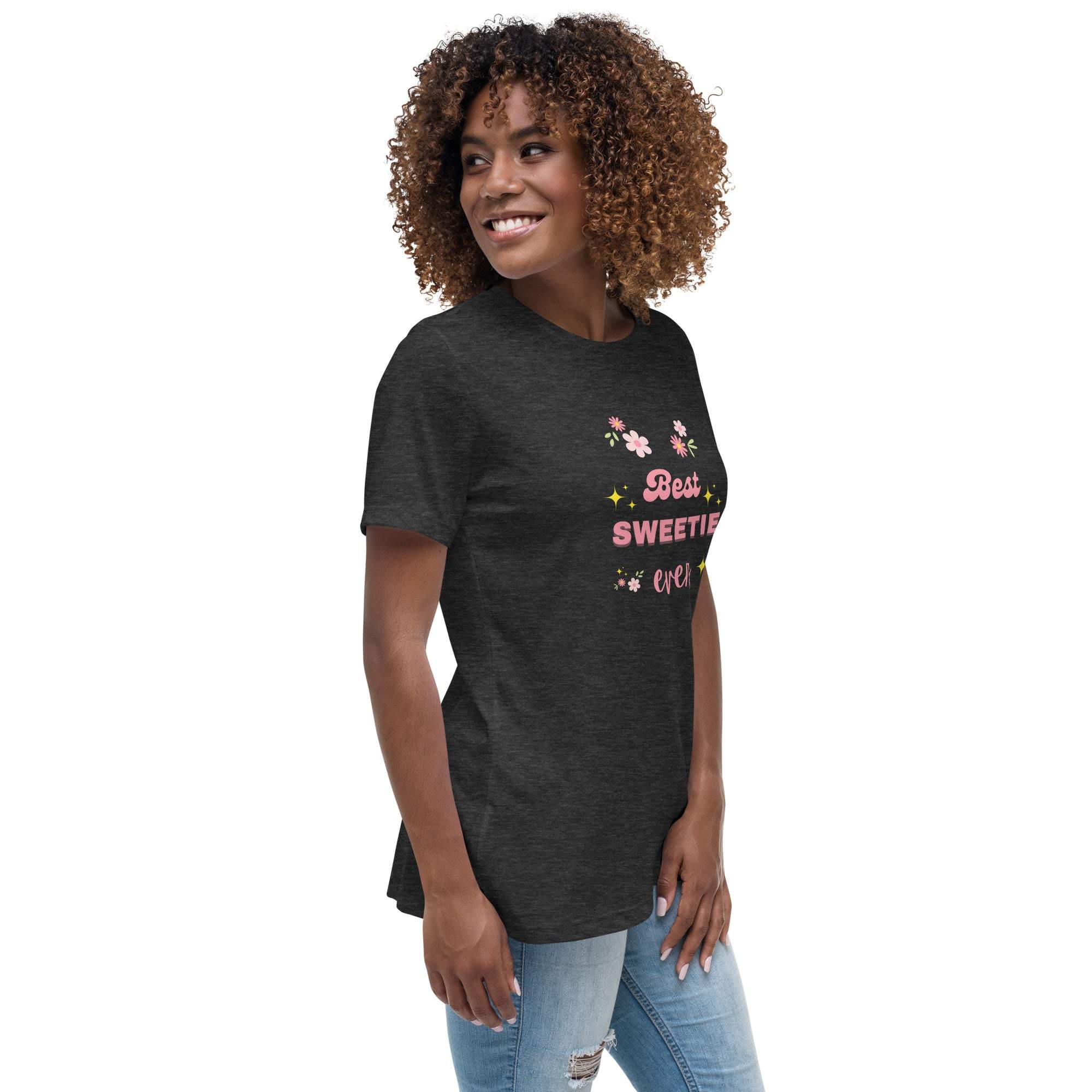 Woman wearing a dark gray Best Sweetie Ever t-shirt with floral and star accents, paired with ripped jeans.