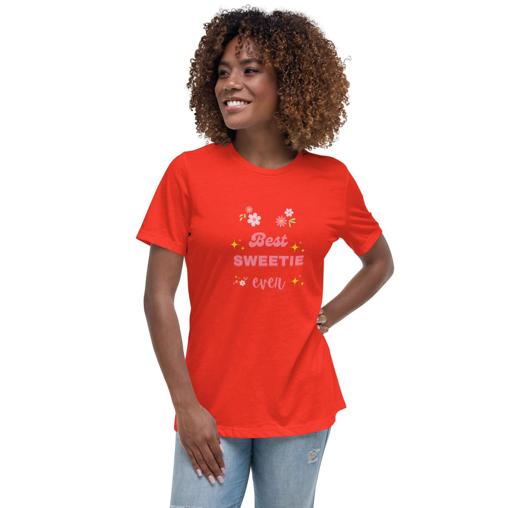 Woman wearing red Best Sweetie Ever t-shirt with floral and star design, paired with jeans.