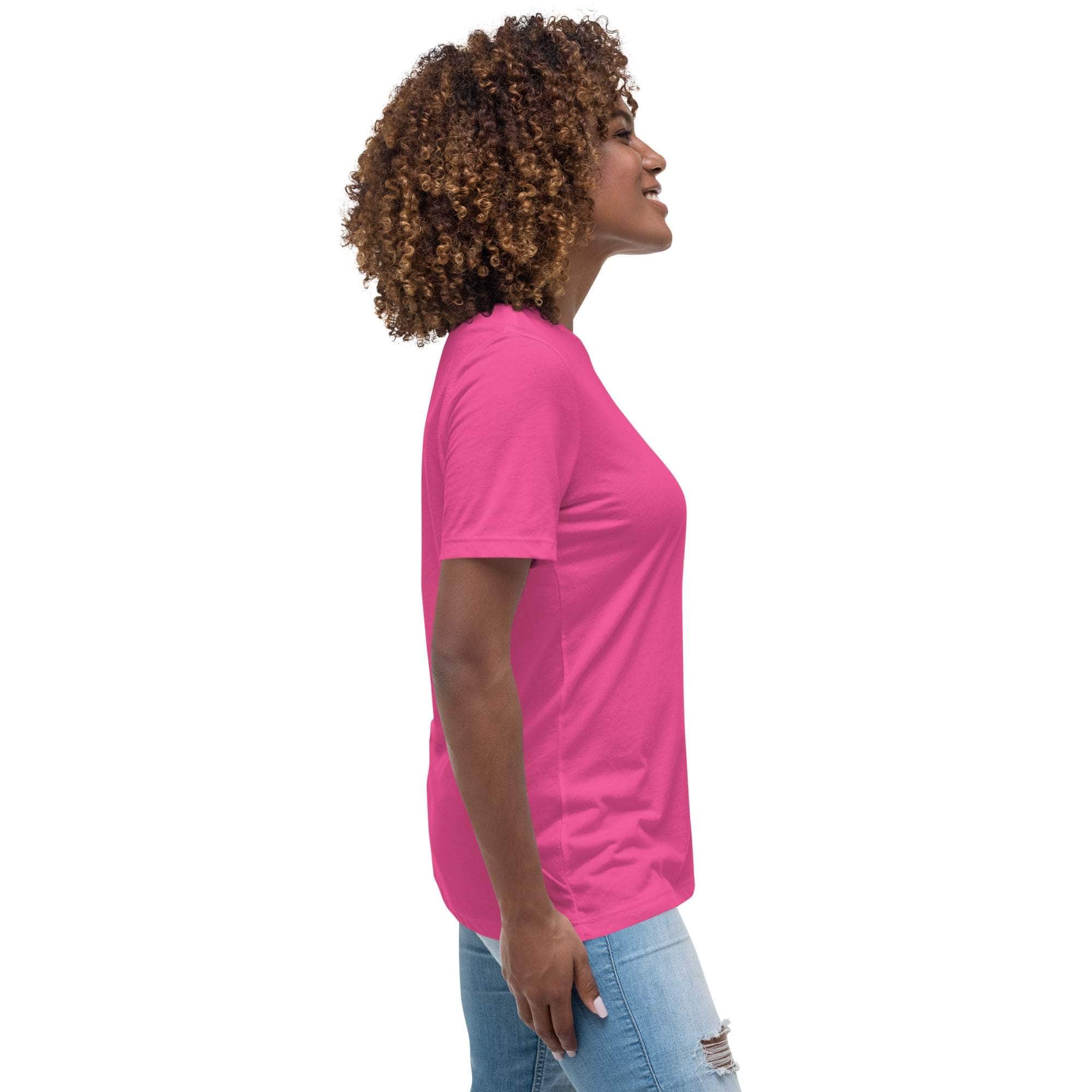 Woman wearing pink Best Sweetie Ever t-shirt in side view with curly hair and blue ripped jeans