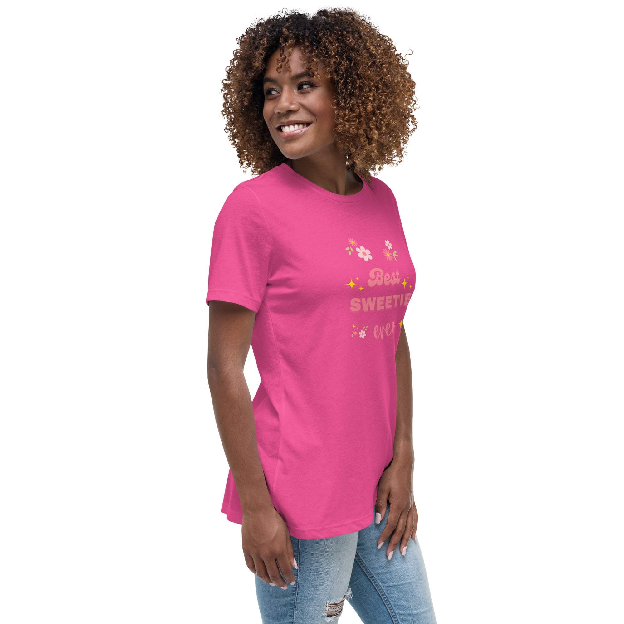 Woman wearing pink Best Sweetie Ever t-shirt with floral and star design, paired with jeans