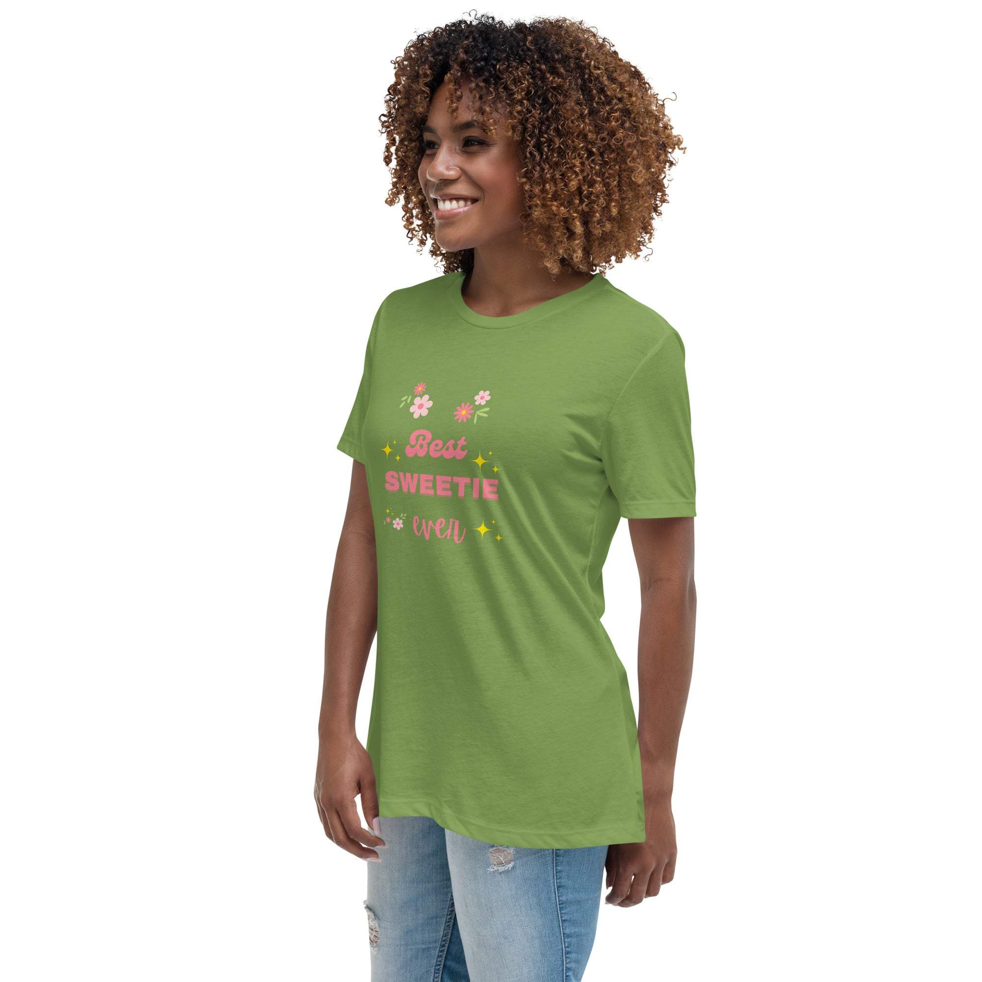 Woman wearing green Best Sweetie Ever t-shirt with floral and star design