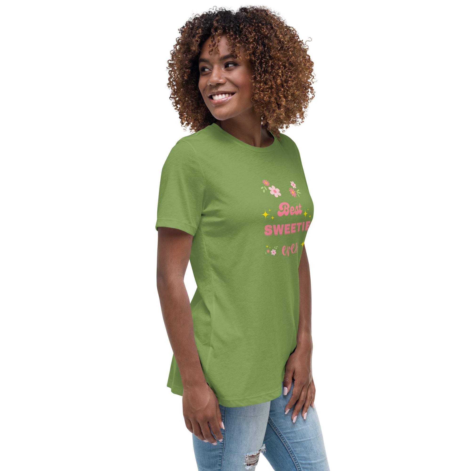 Woman wearing green Best Sweetie Ever t-shirt with floral and star print and casual jeans