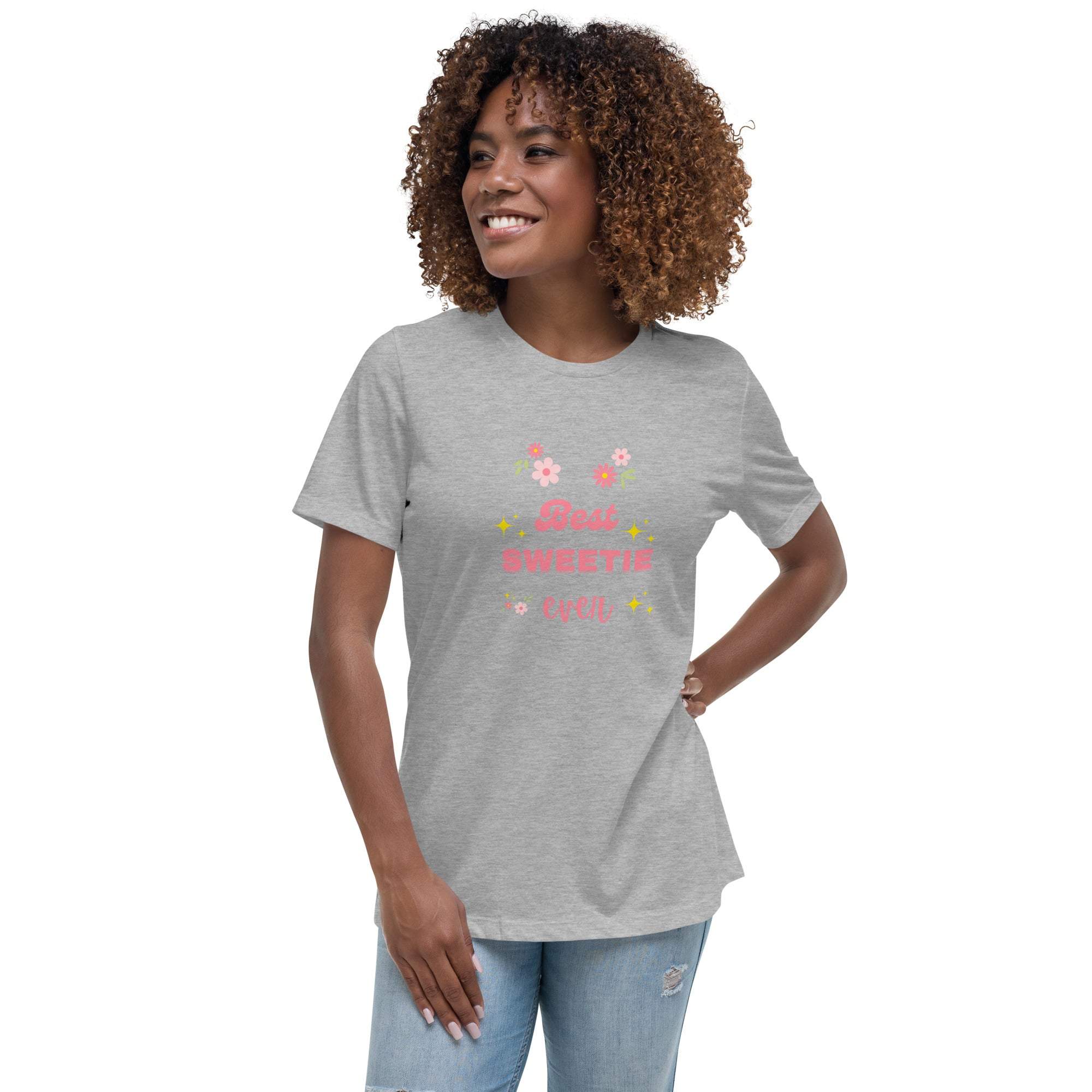 Woman wearing grey "Best Sweetie Ever" t-shirt with floral and star design in casual jeans