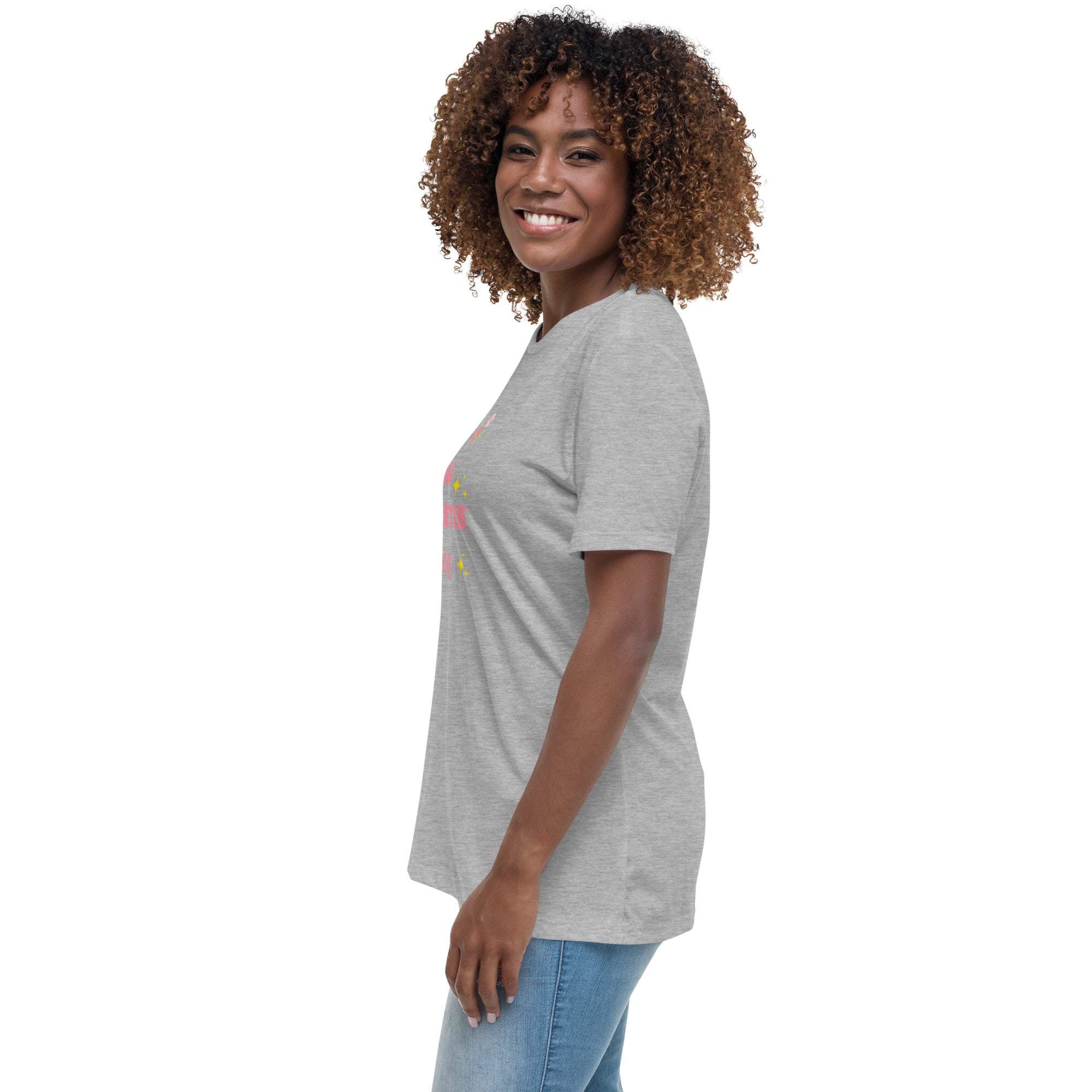 Woman wearing a grey Best Sweetie Ever t-shirt with floral and star design, paired with blue jeans, smiling and posing sideways.