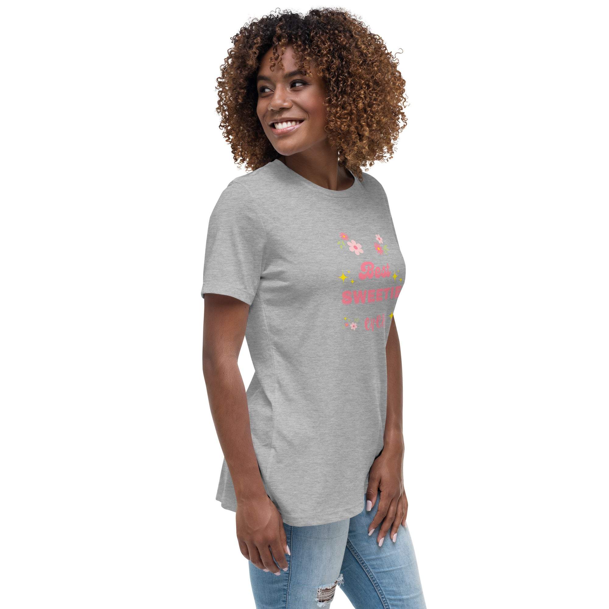 Woman wearing a grey Best Sweetie Ever t-shirt with floral and star design, paired with ripped jeans