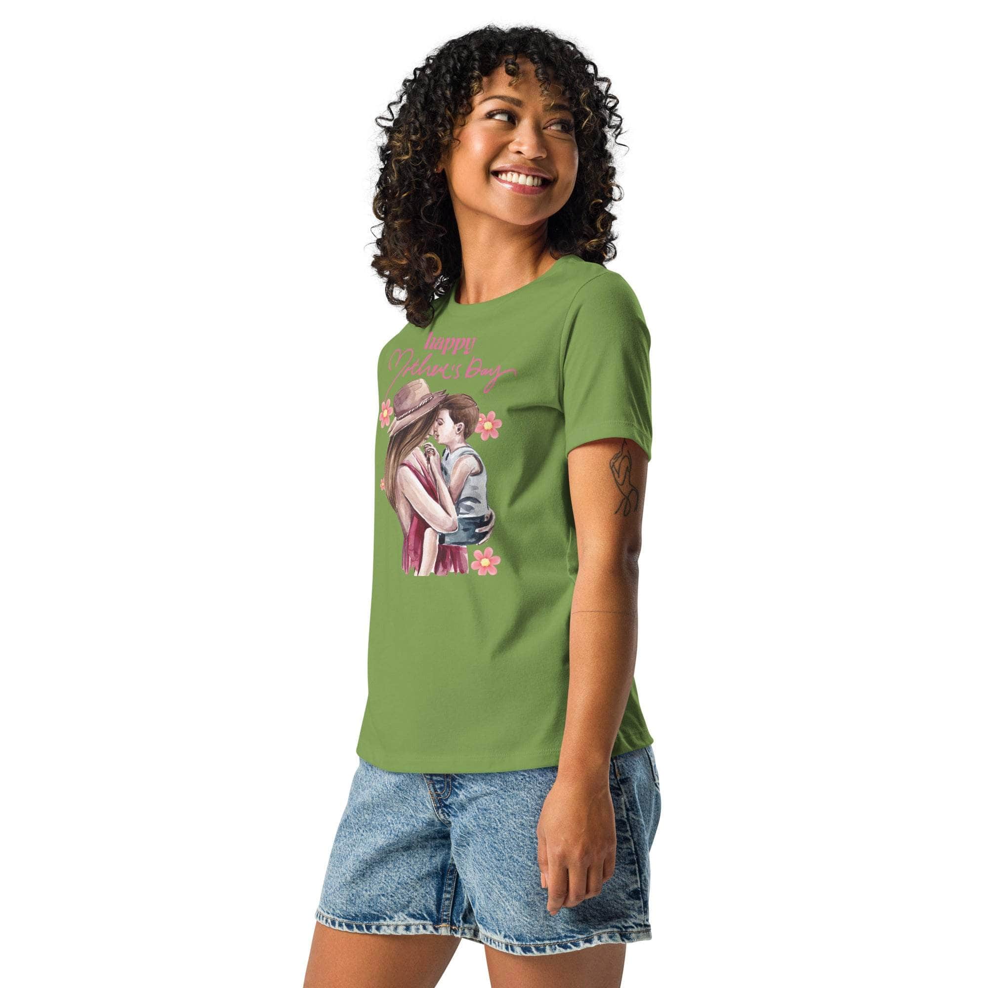 Woman wearing green Mothers Day T-shirt with mom and child graphic and floral design