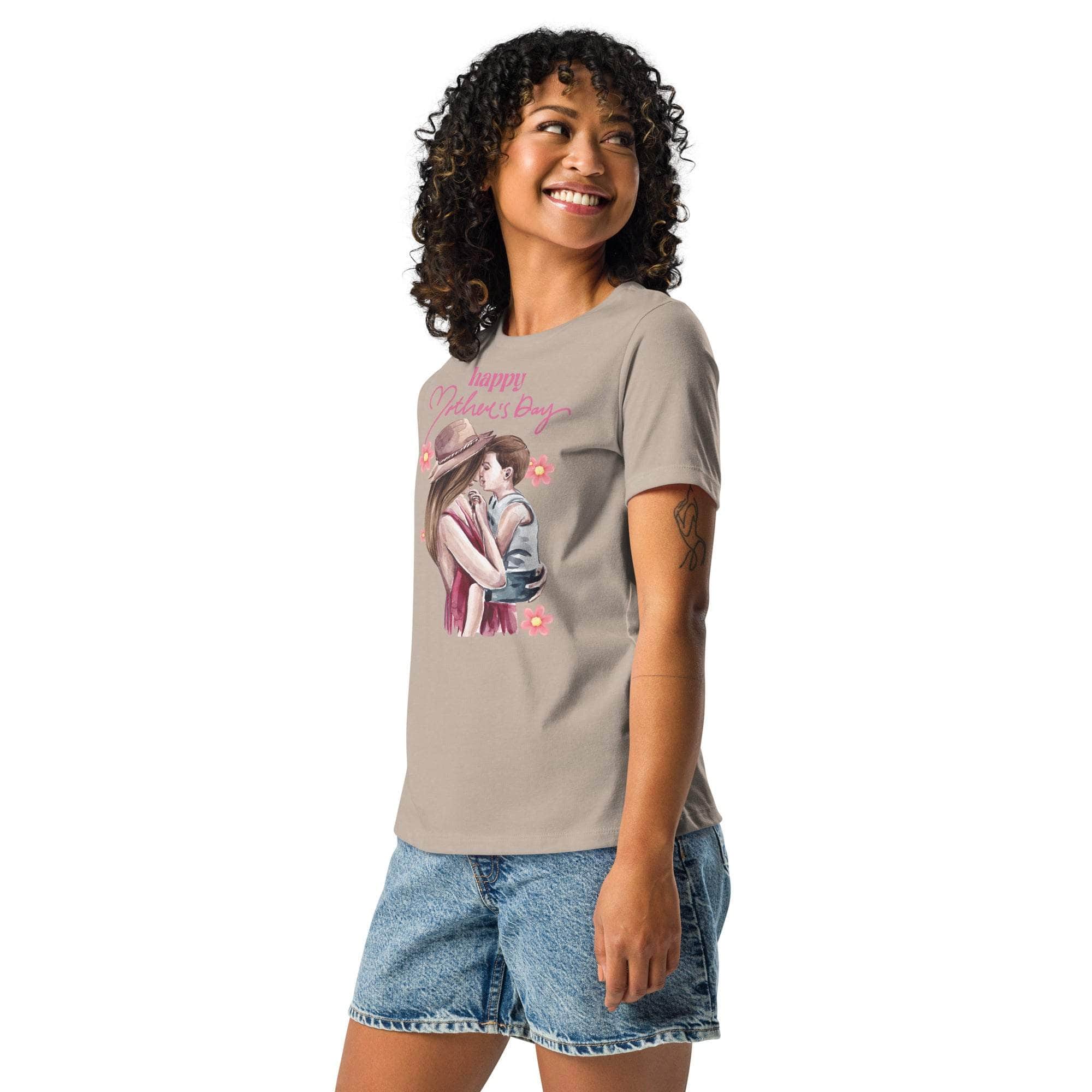 Woman wearing a beige Mothers Day T-Shirt with a mom and child graphic and "Happy Mother's Day" text, paired with denim shorts