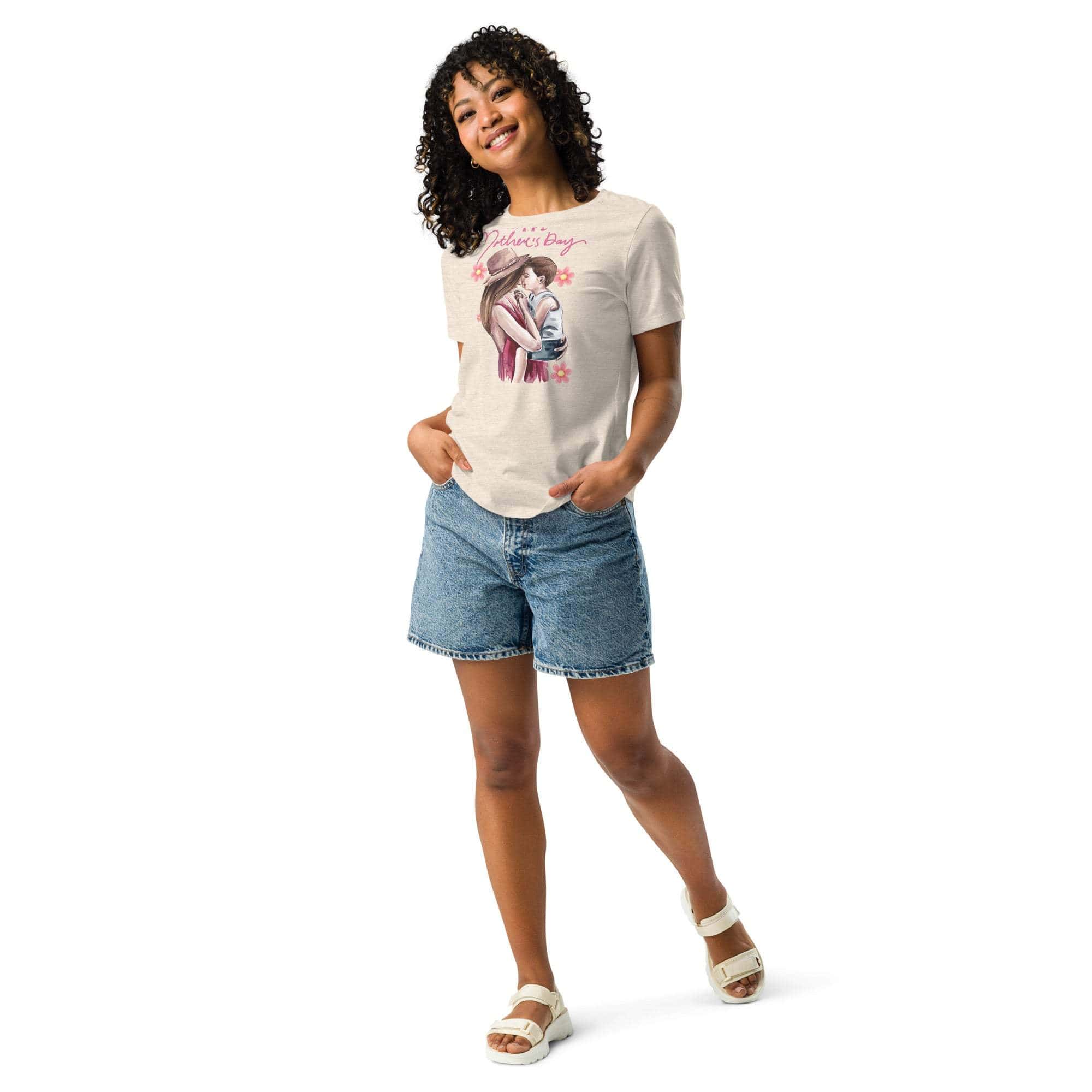 Woman wearing Mothers Day T-Shirt with mom and child graphic and denim shorts.