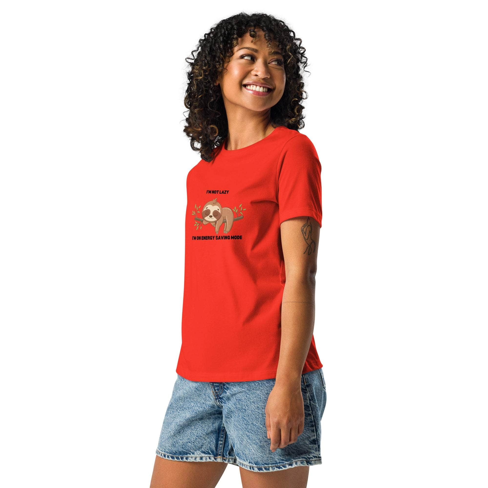 Woman wearing red "I'm Not Lazy, I am On Energy Saving Mode" sloth graphic t-shirt with denim shorts