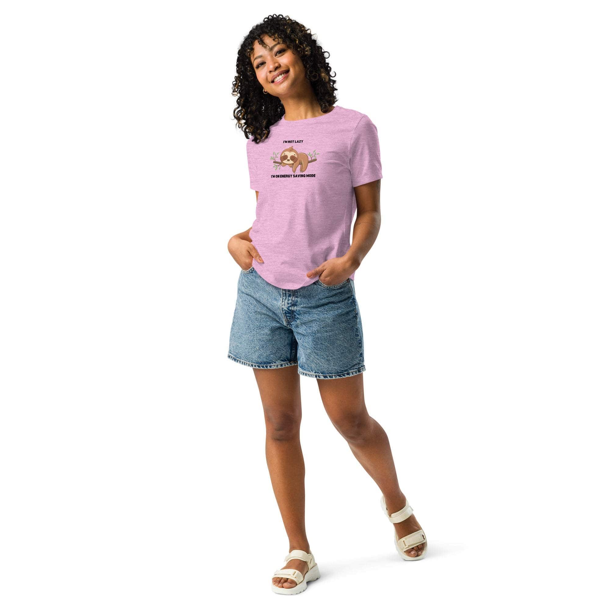 Woman wearing pink "I'm Not Lazy, I Am On Energy Saving Mode" sloth t-shirt with denim shorts and white sandals
