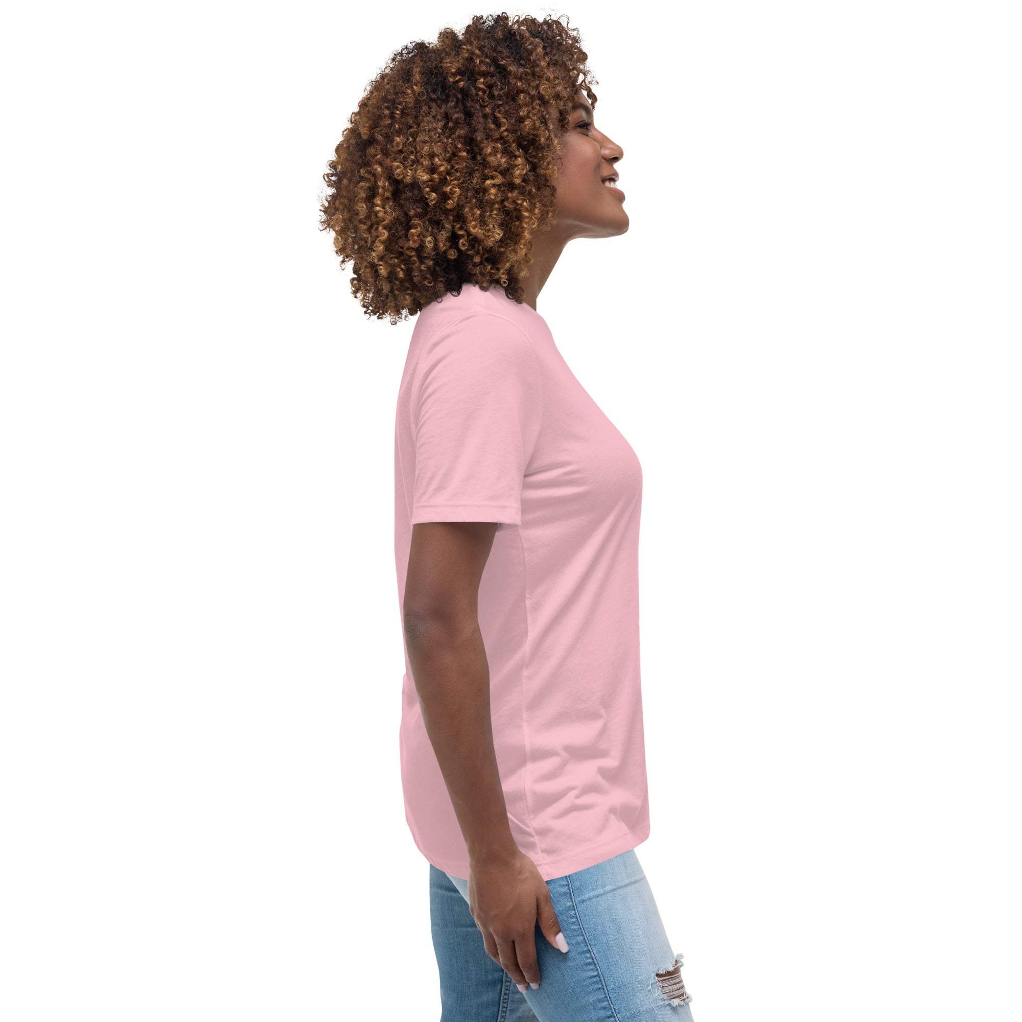 Side view of woman wearing pink Live Laugh Loot T-Shirt with raccoon design and casual jeans