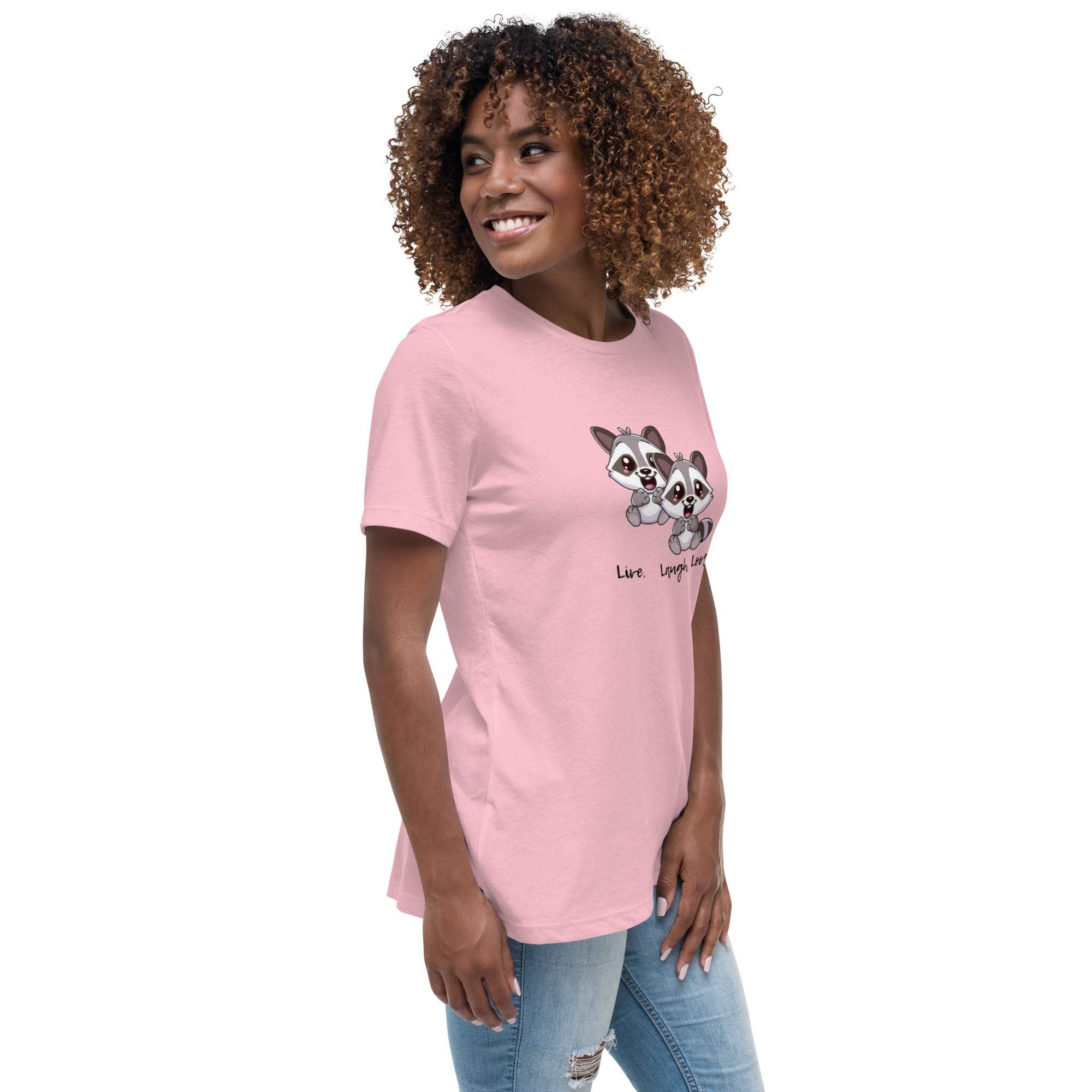Woman wearing pink Live Laugh Loot T-Shirt with cute raccoon graphic and text on front