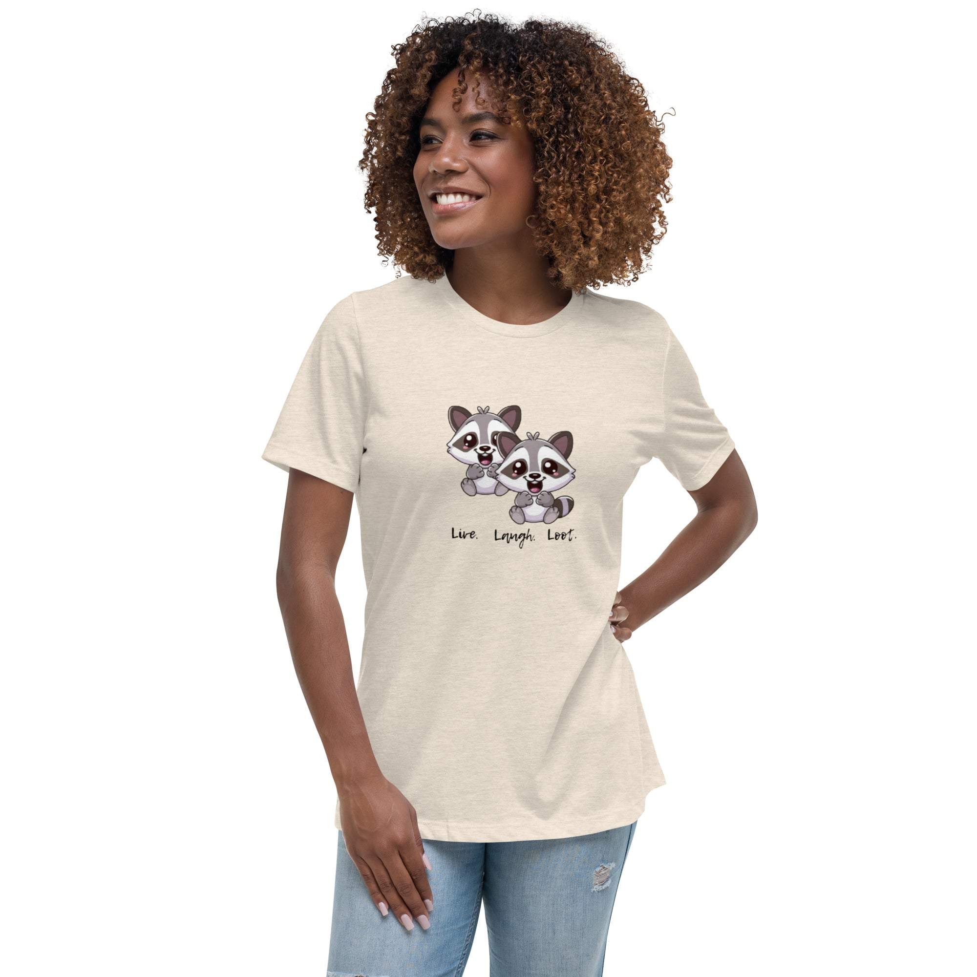 Woman wearing beige Live Laugh Loot T-Shirt with cute raccoon graphic and text.