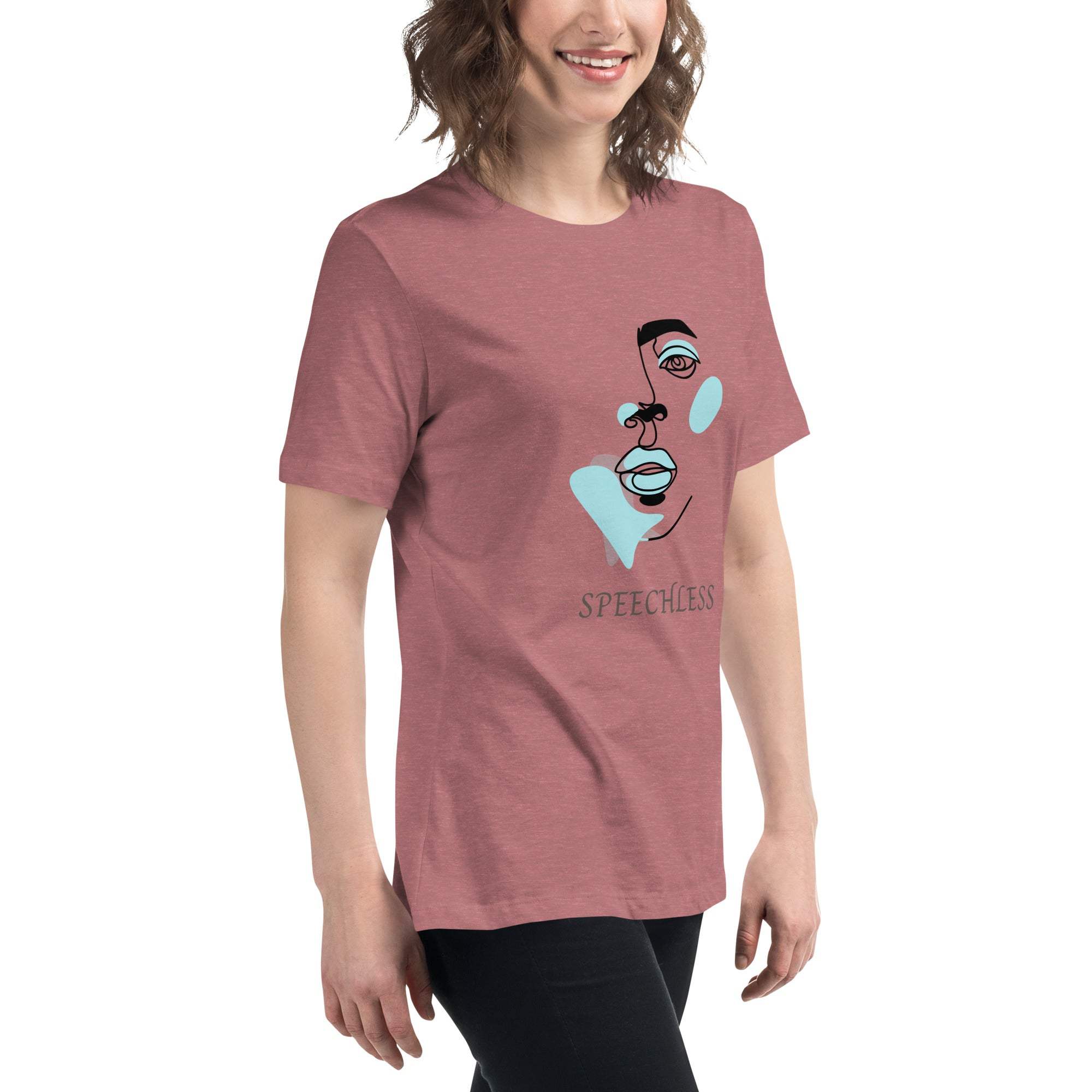 Woman wearing a minimalist speechless face line art t-shirt in muted red color with abstract blue and black face design and the word "Speechless" printed below.