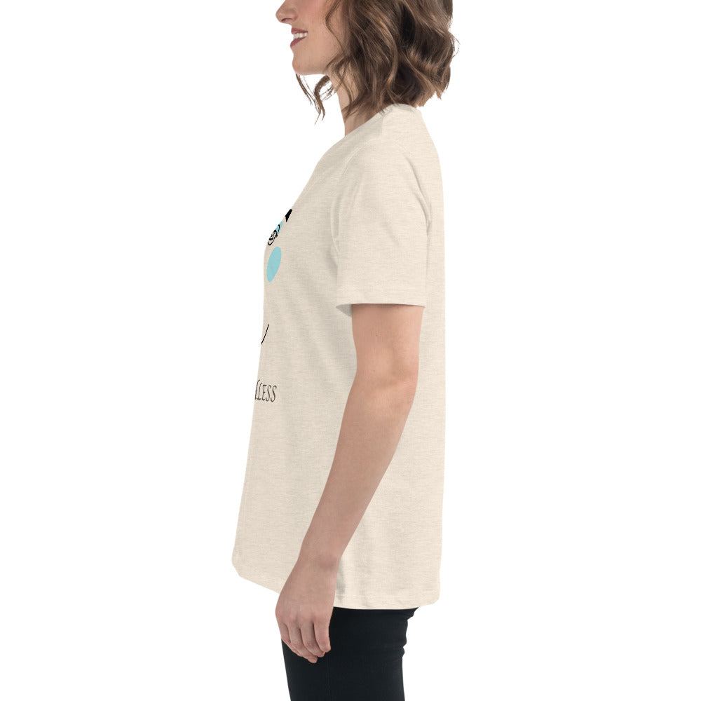 Woman wearing beige minimalist speechless face line art t-shirt in side view