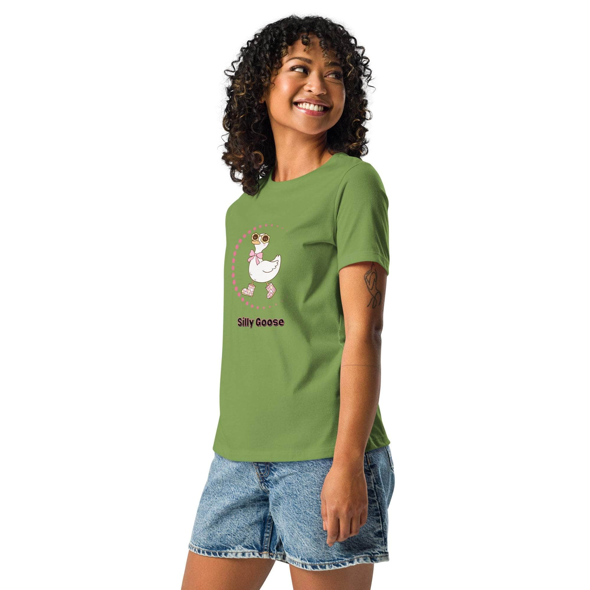 Woman wearing green Silly Goose Graphic T-Shirt with playful illustrated goose and text, paired with denim shorts.