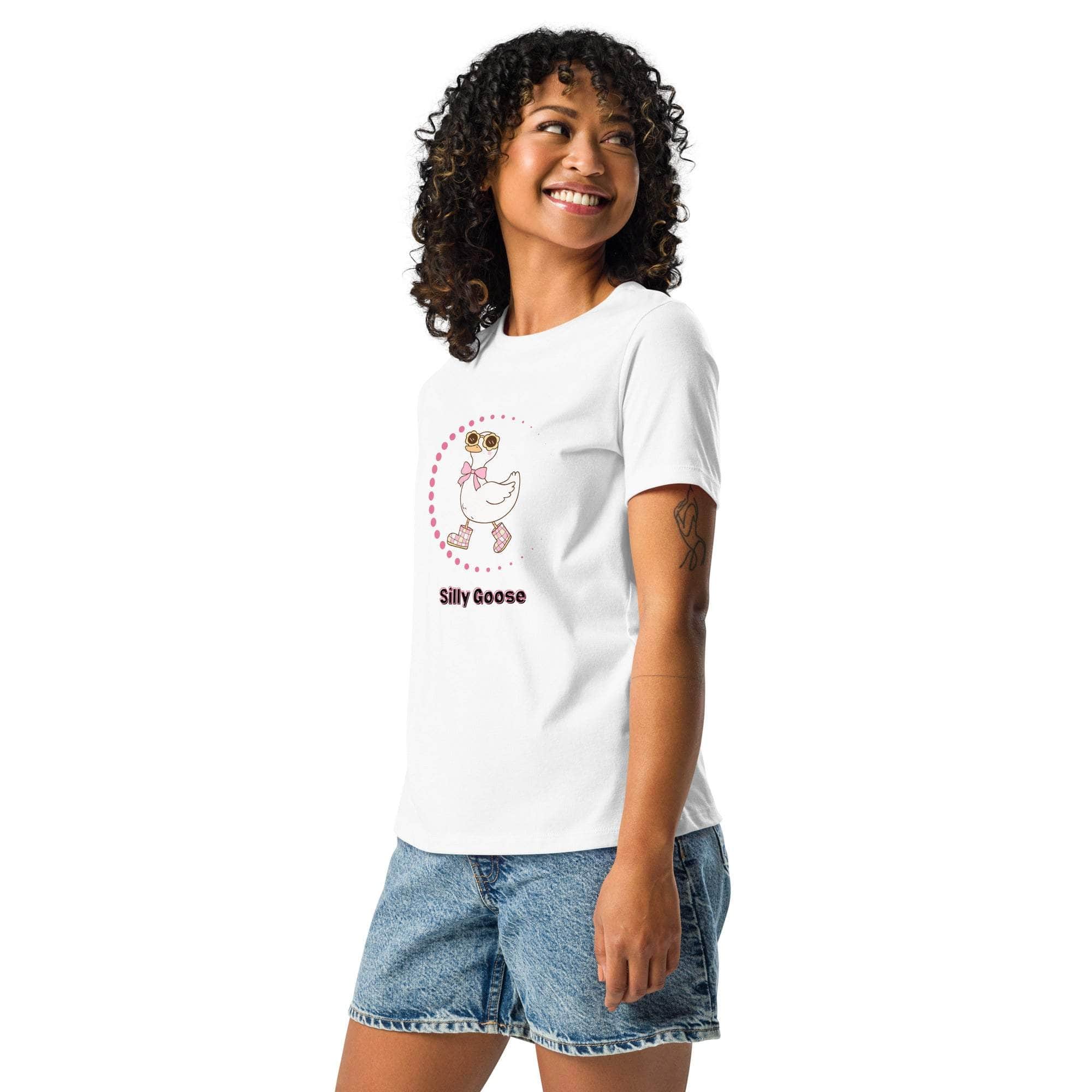 Woman wearing white Silly Goose Graphic T-Shirt with playful illustrated goose and text, paired with denim shorts