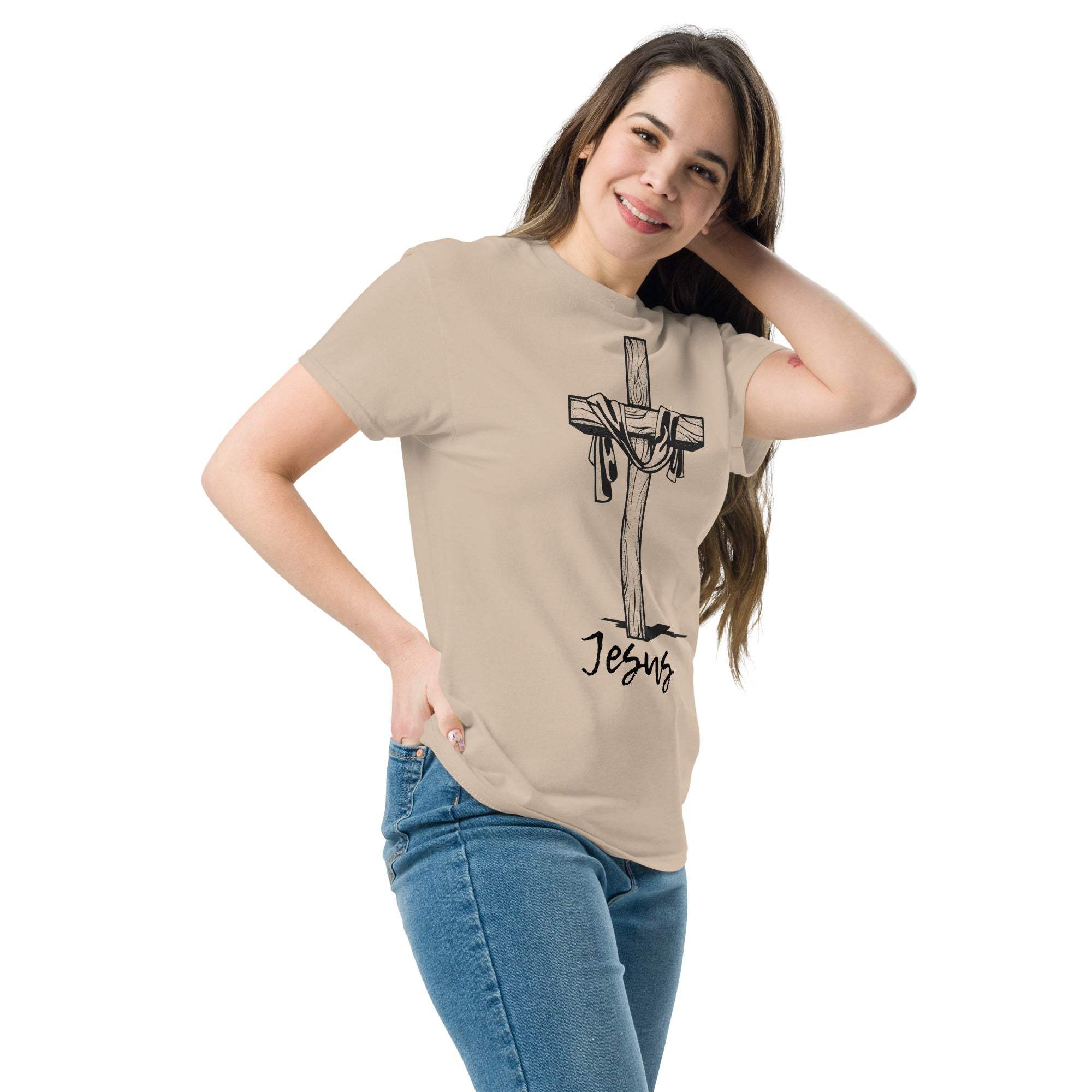 Woman wearing beige Christian Cross T-Shirt with Jesus graphic and blue jeans