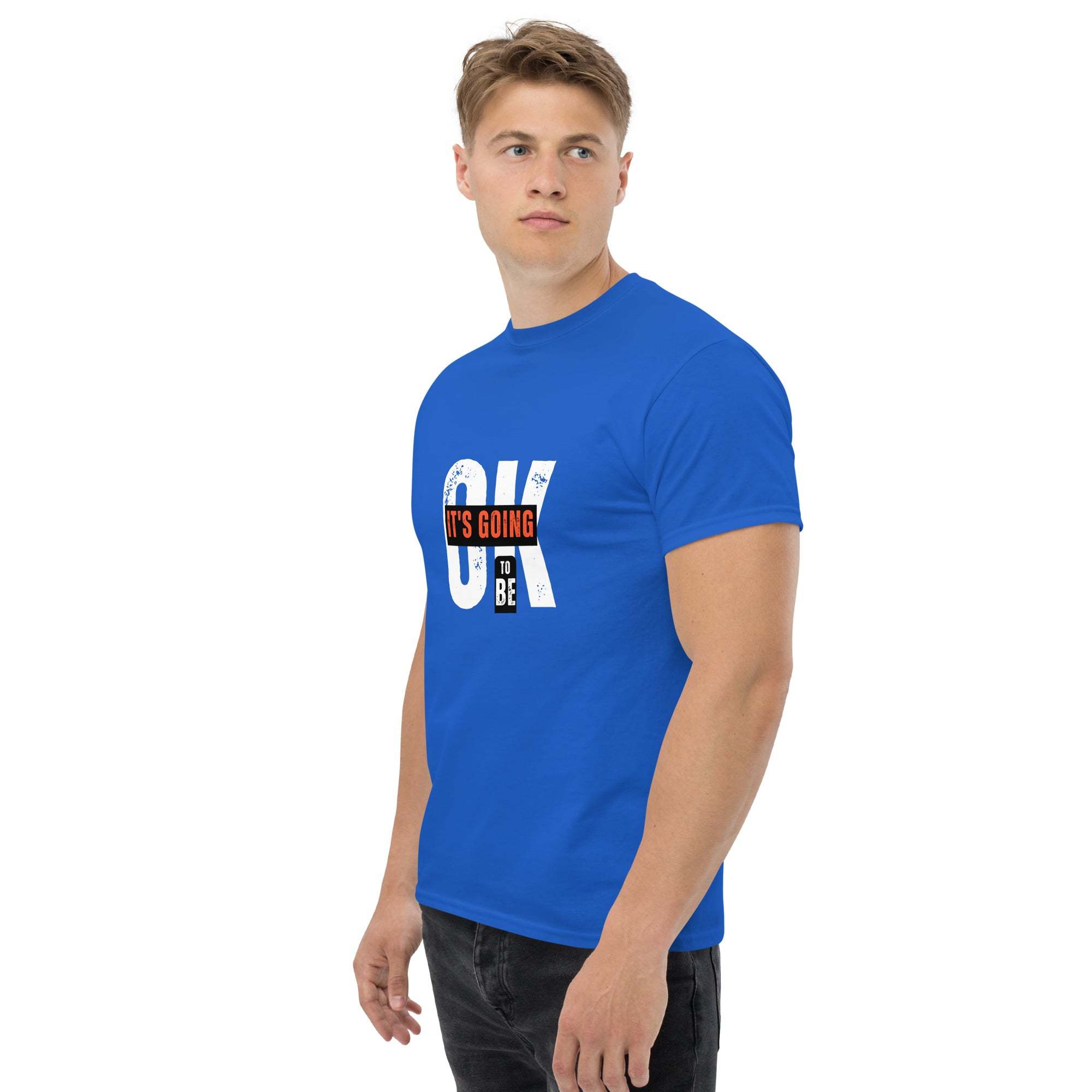 Male model wearing blue trendy graphic t-shirt with motivational quote for casual summer street style