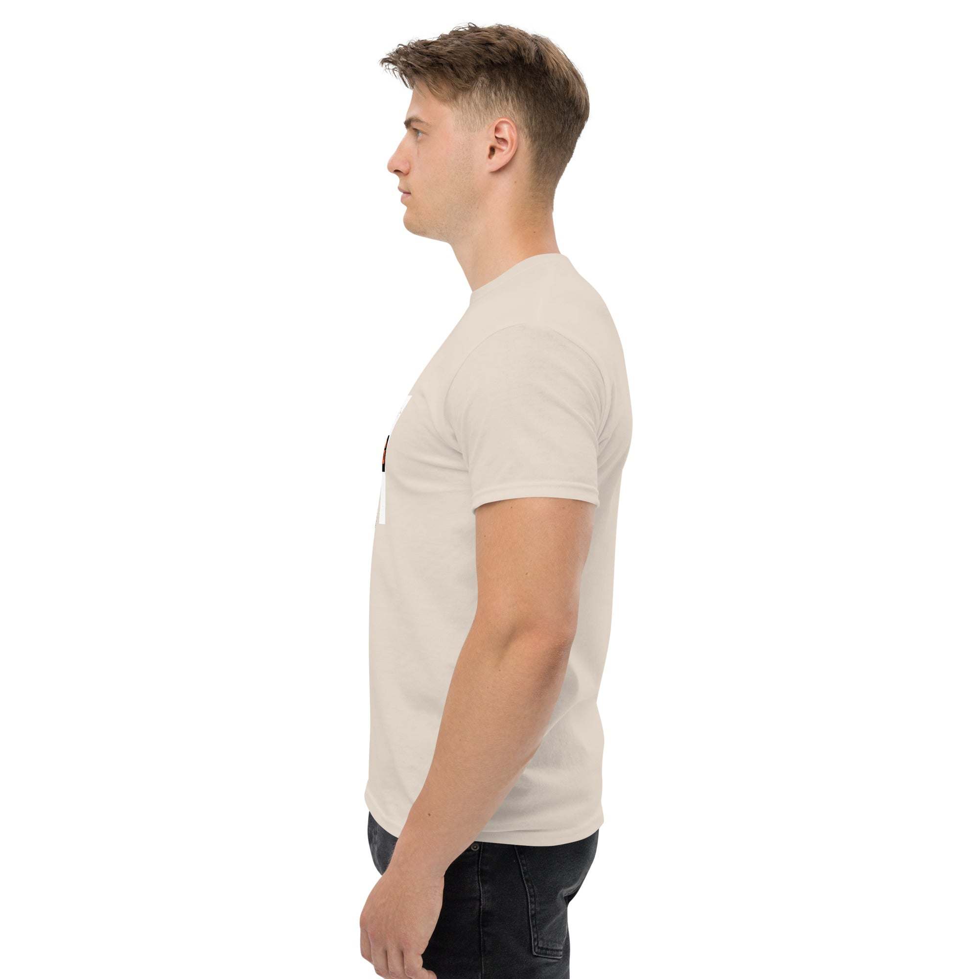 Side view of man wearing beige trendy graphic t-shirt with motivational quote in casual streetwear style