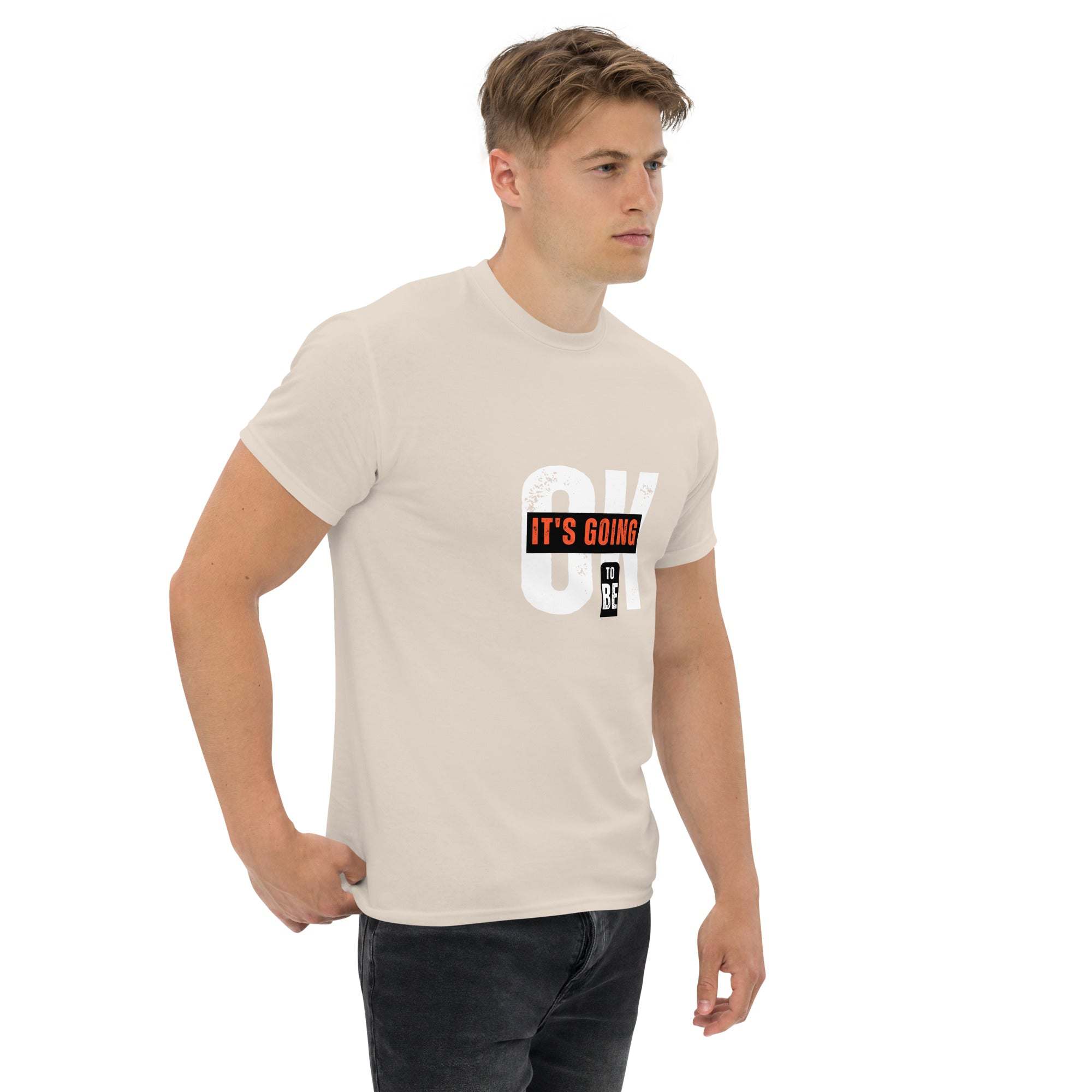 Man wearing beige trendy graphic t-shirt with motivational quote print
