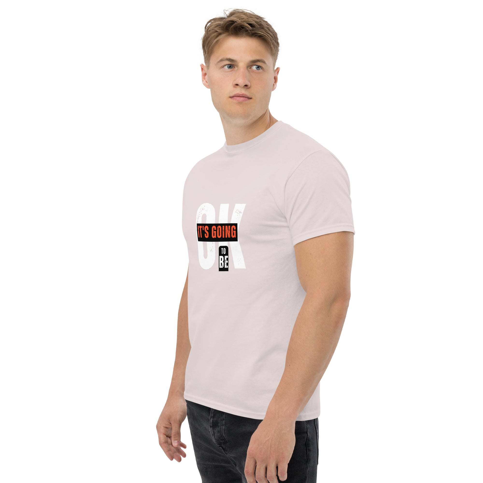 young man wearing trendy graphic t-shirt with motivational quote in casual streetwear style