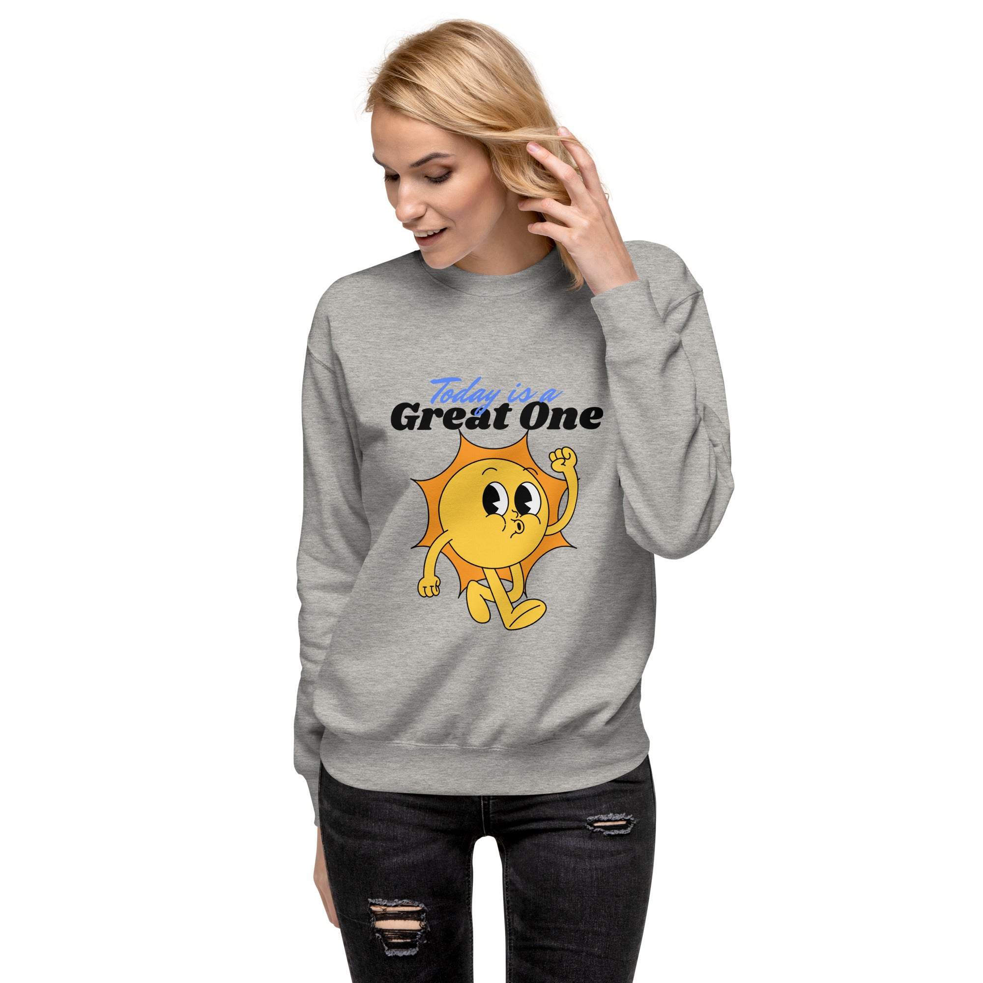 Woman wearing grey Positive Sun Sweatshirt with uplifting sun graphic and "Today is a Great One" text