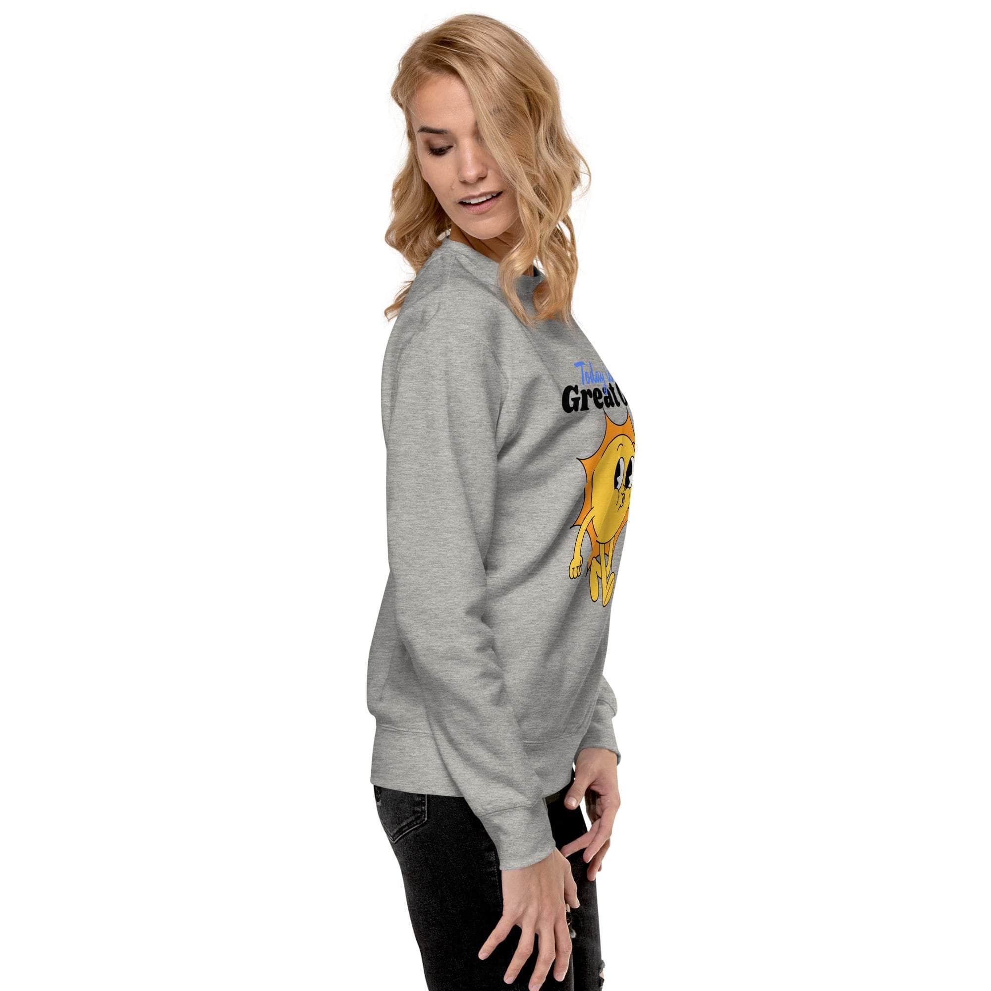 Woman wearing gray Positive Sun Sweatshirt with cheerful sun graphic and motivational text, side view